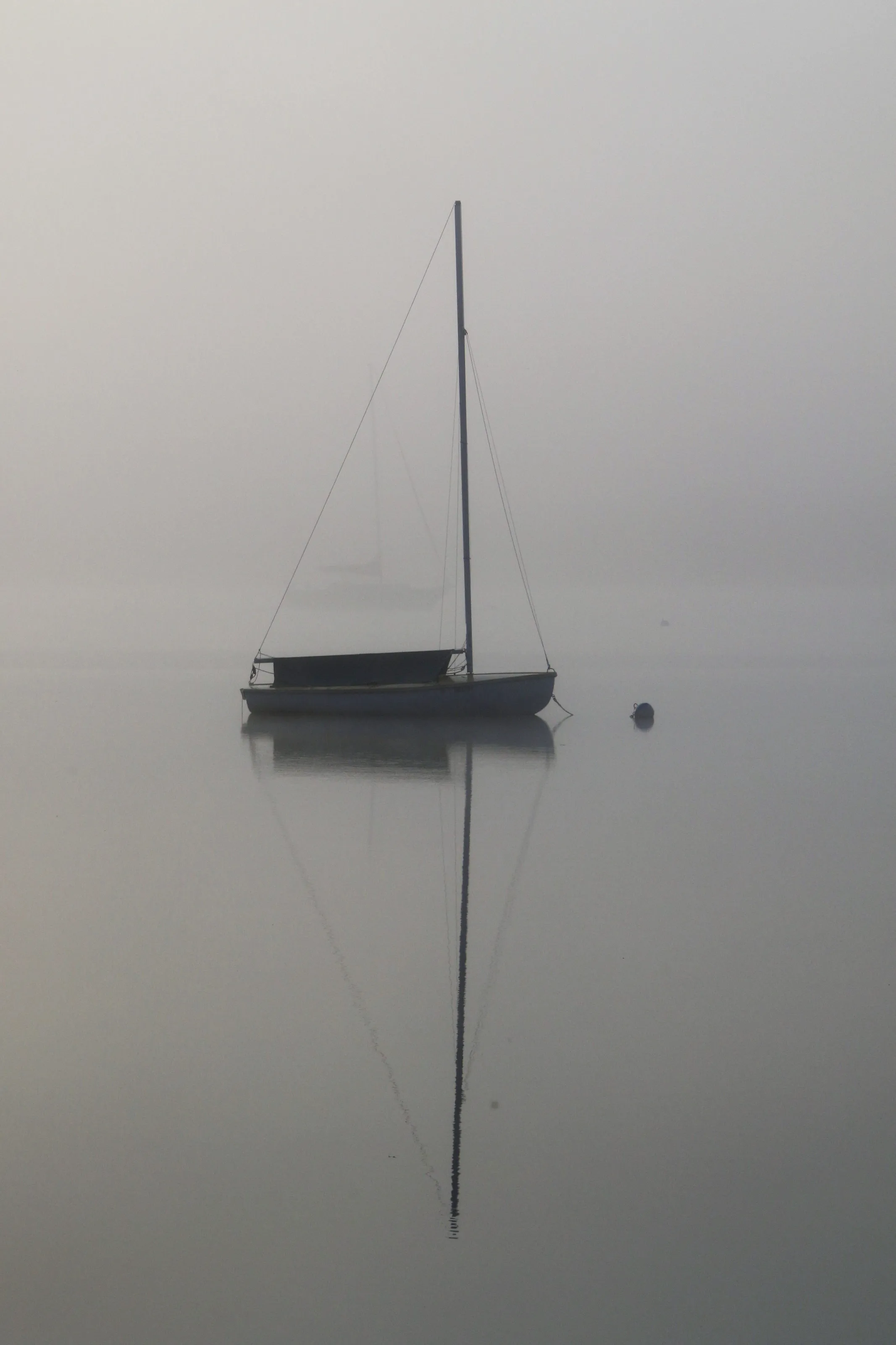 Suttons Bay Foggy Reflection