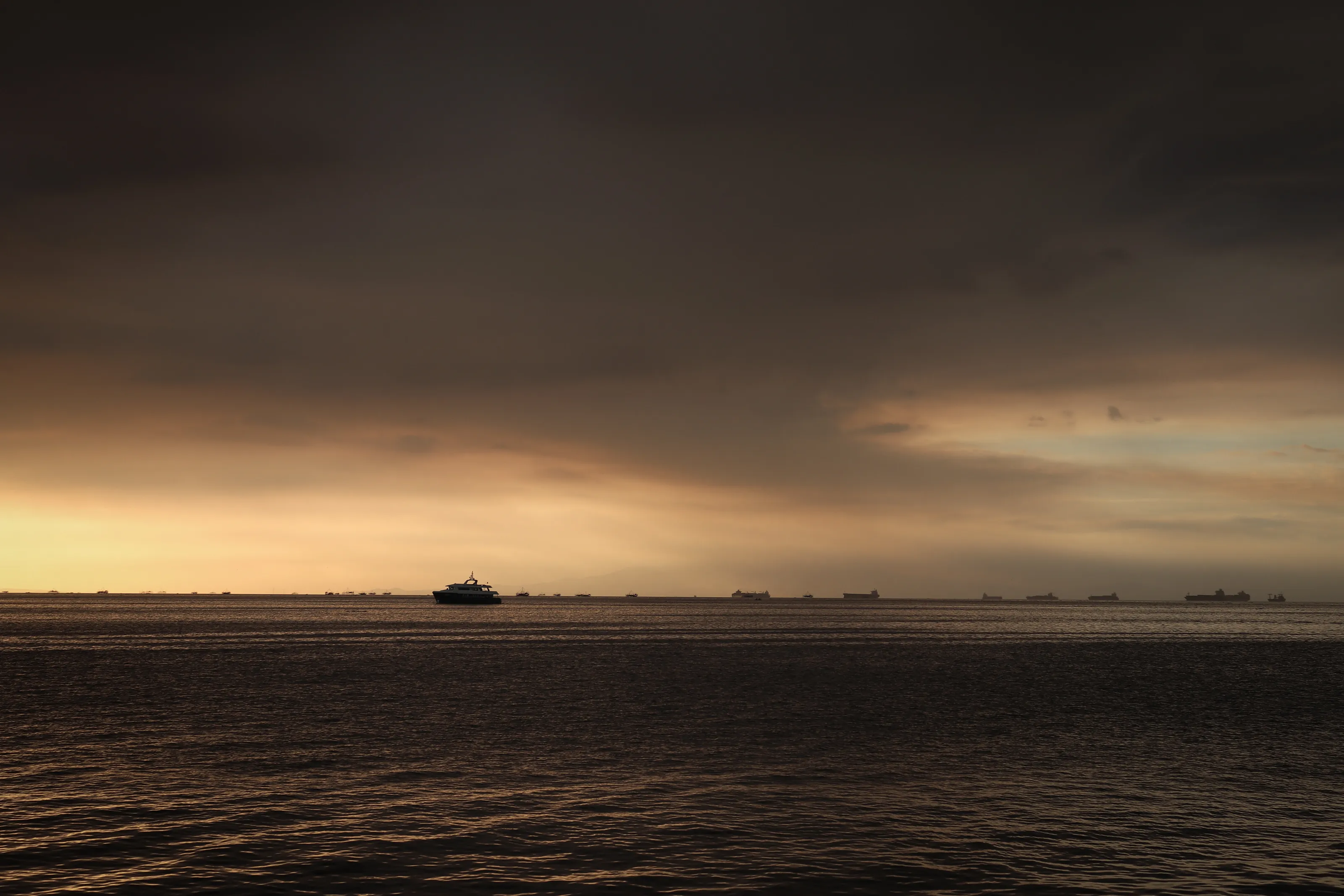 The Sun kisses the Sea in the Philippines (Manila Bay)