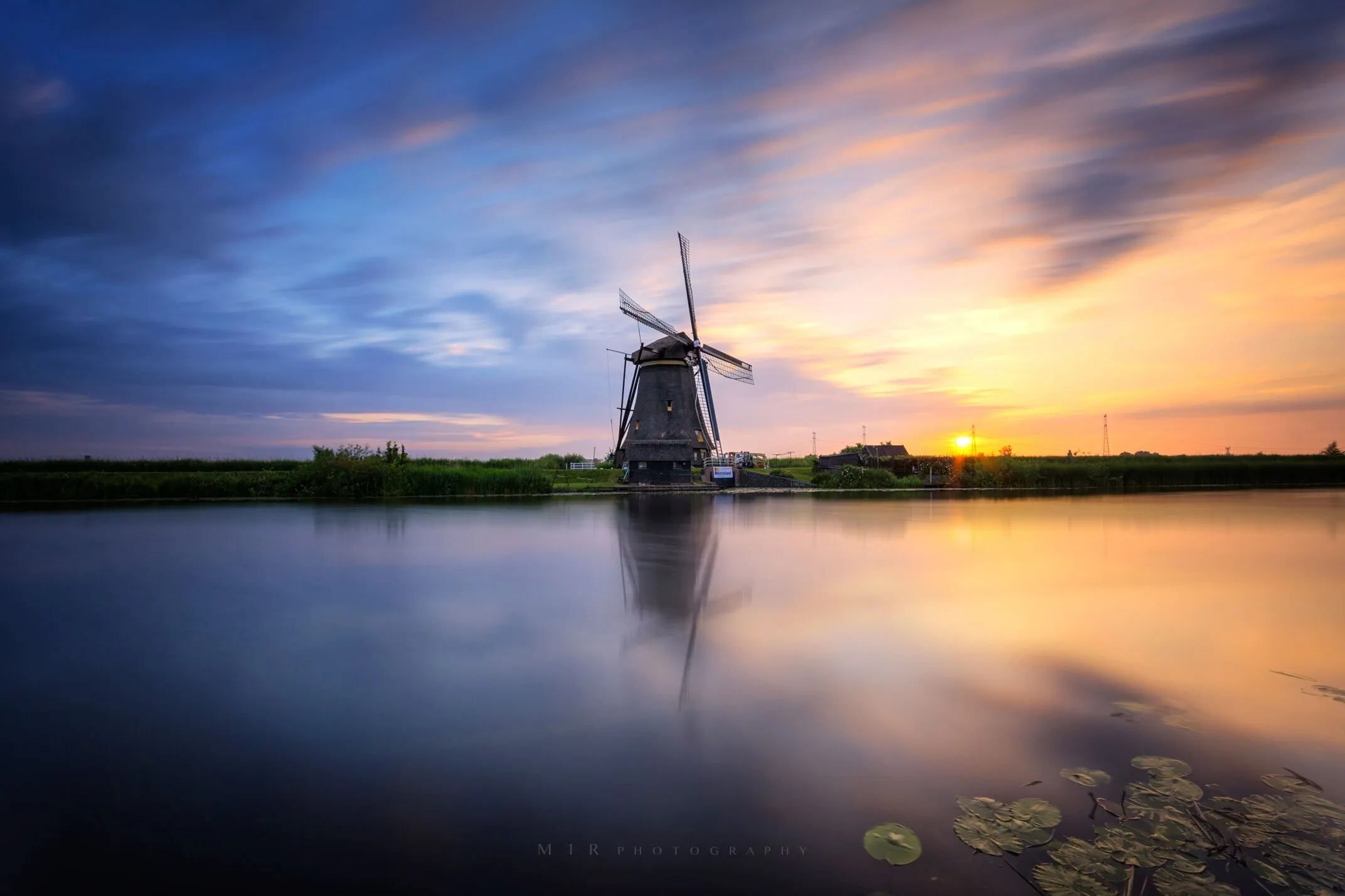 Windmill at sunrise Kinderdijk Holland
