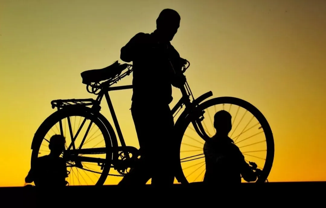 Three Workers with their bi-cycles