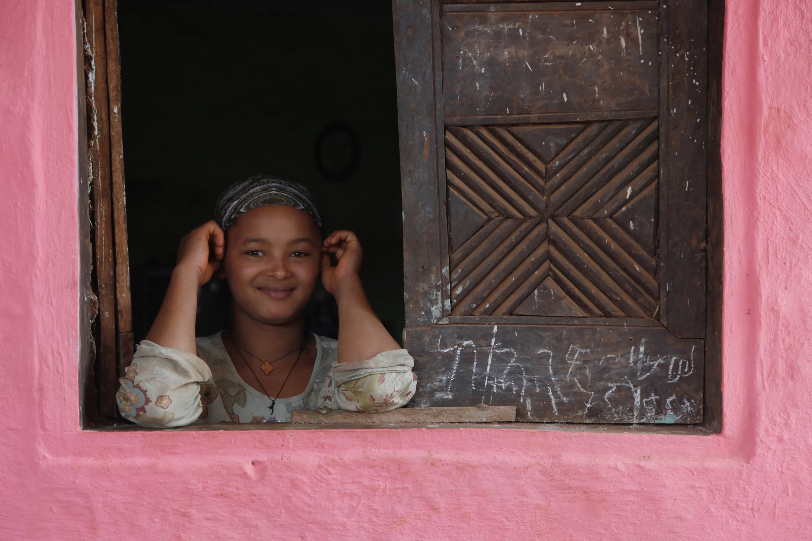Girl by her window in Masha, Ethiopia