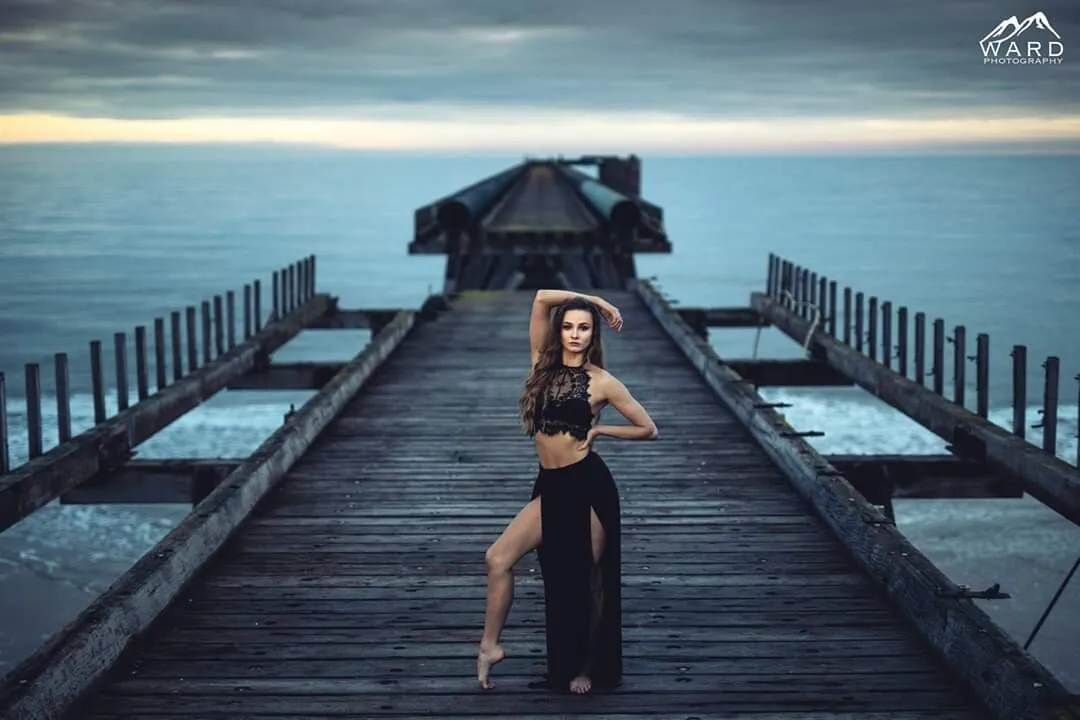On the pier before sunrise