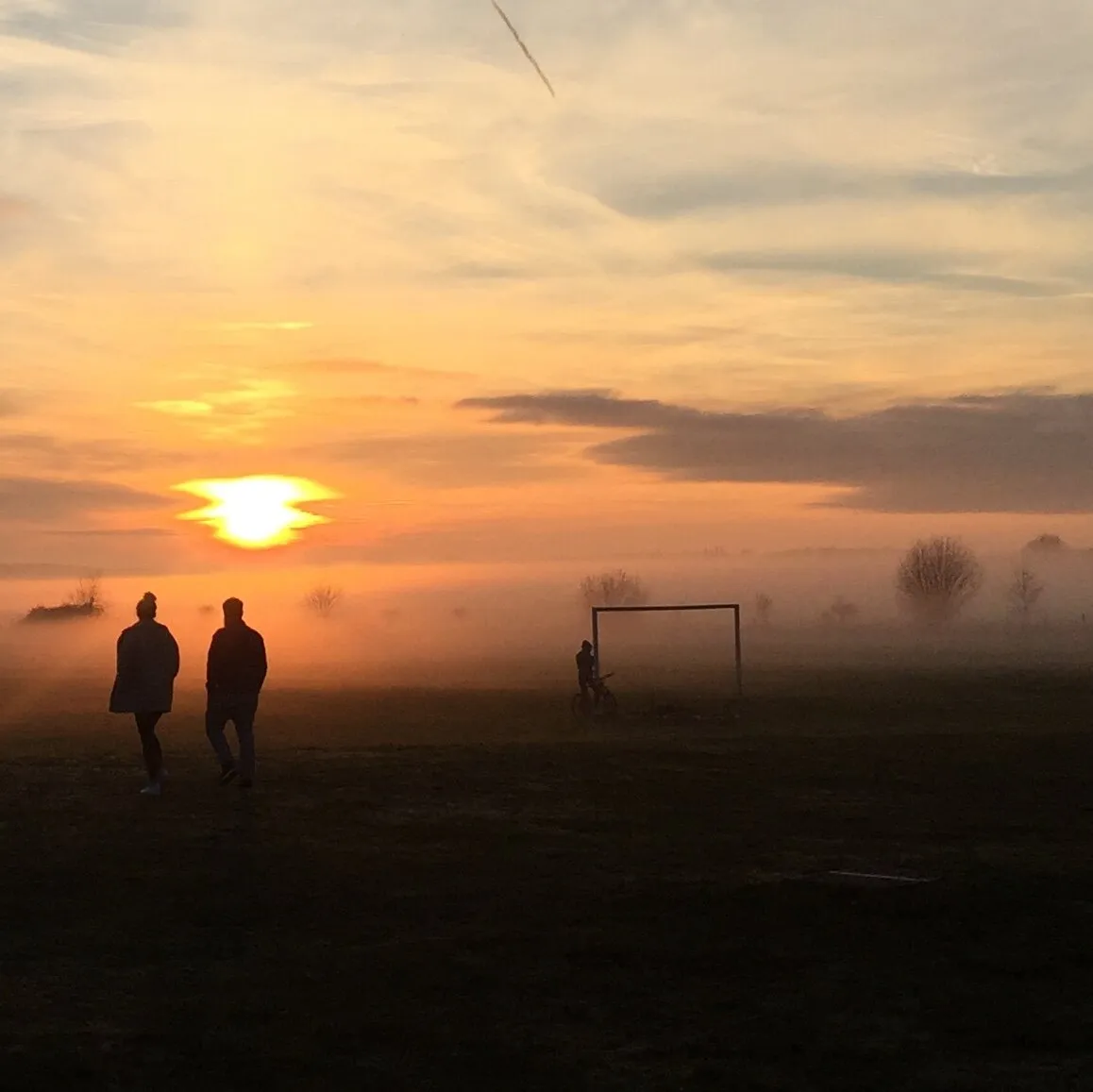 Misty coastal sunset