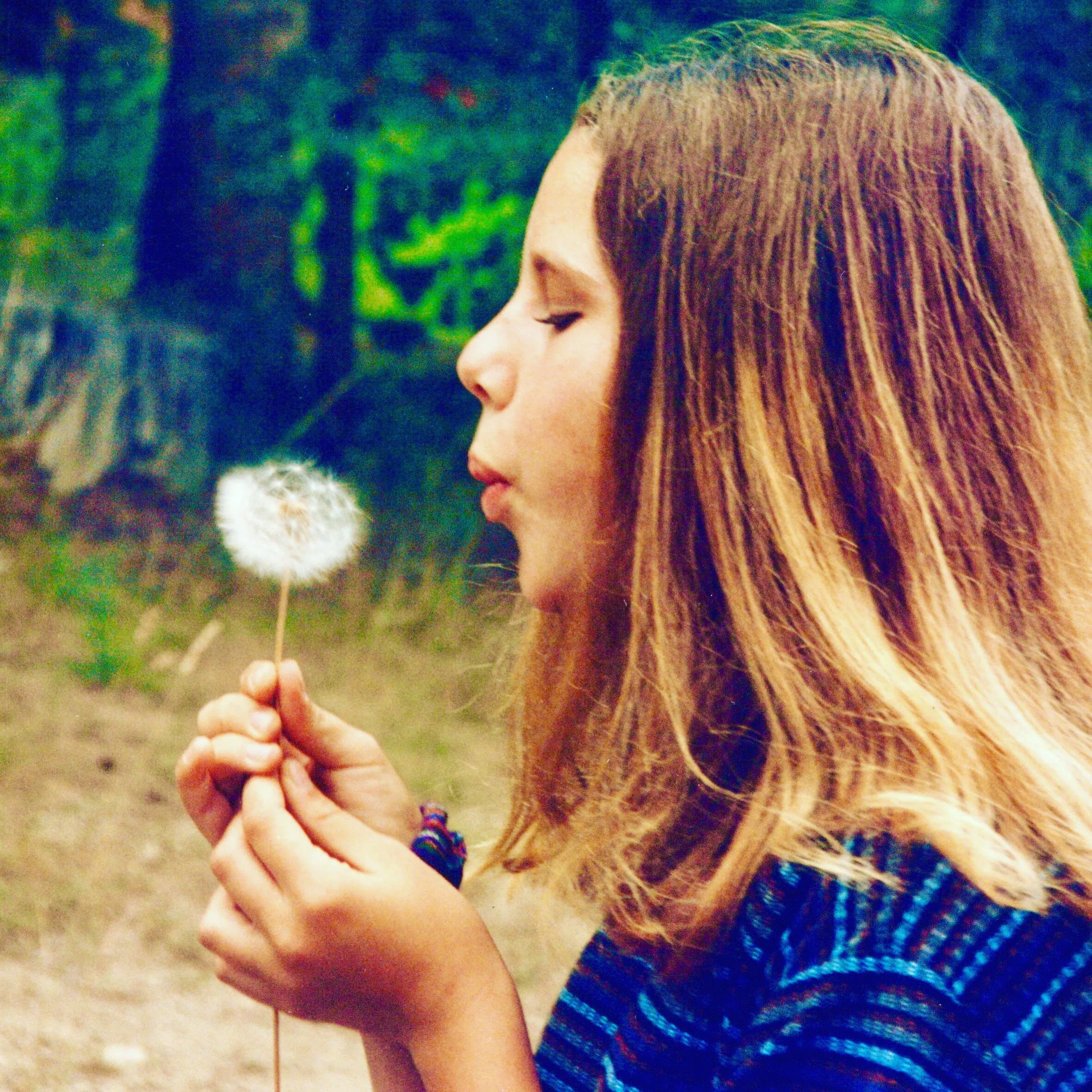 Anne with dandelion puff
