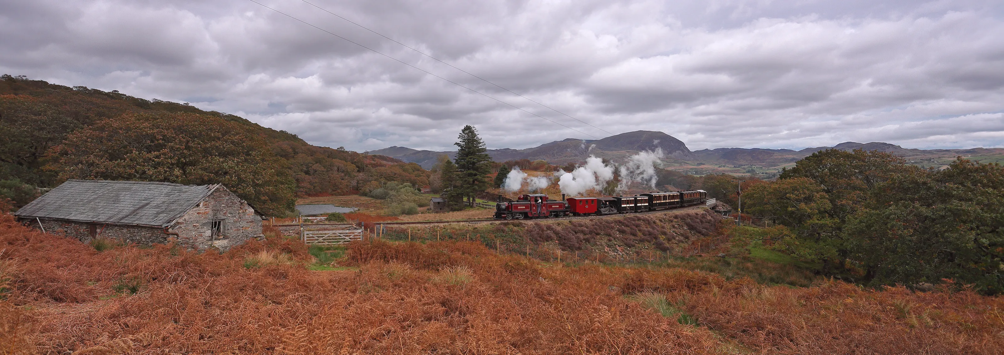 Merddin Emrys with vintage train at Barn.