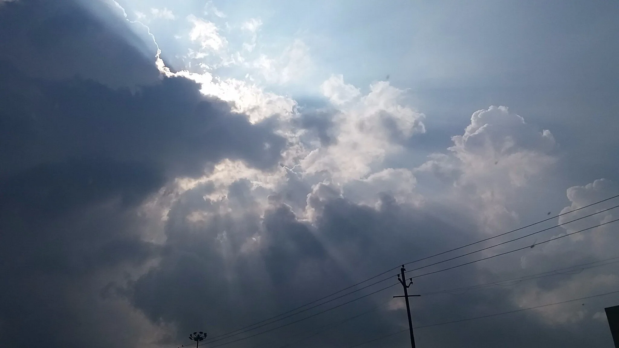 A shying sun....looking all of us from behind clouds