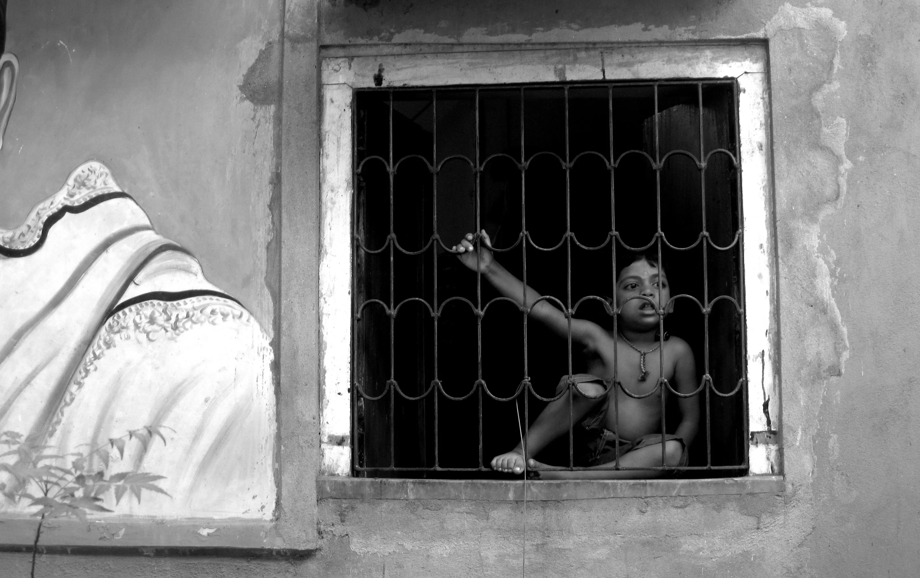 The innocence of childhood through a window