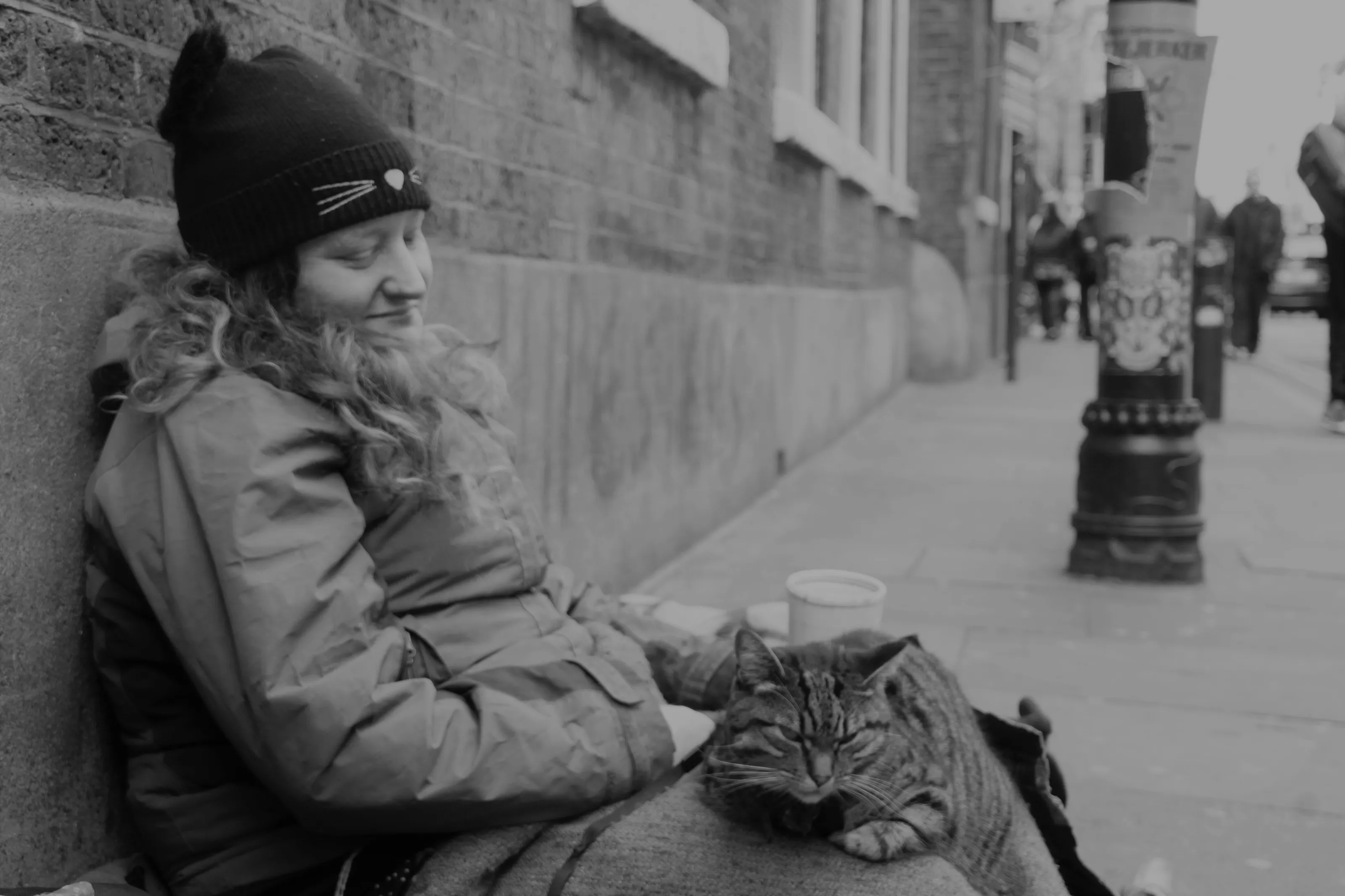 HOMELESS WOMAN WITH CAT