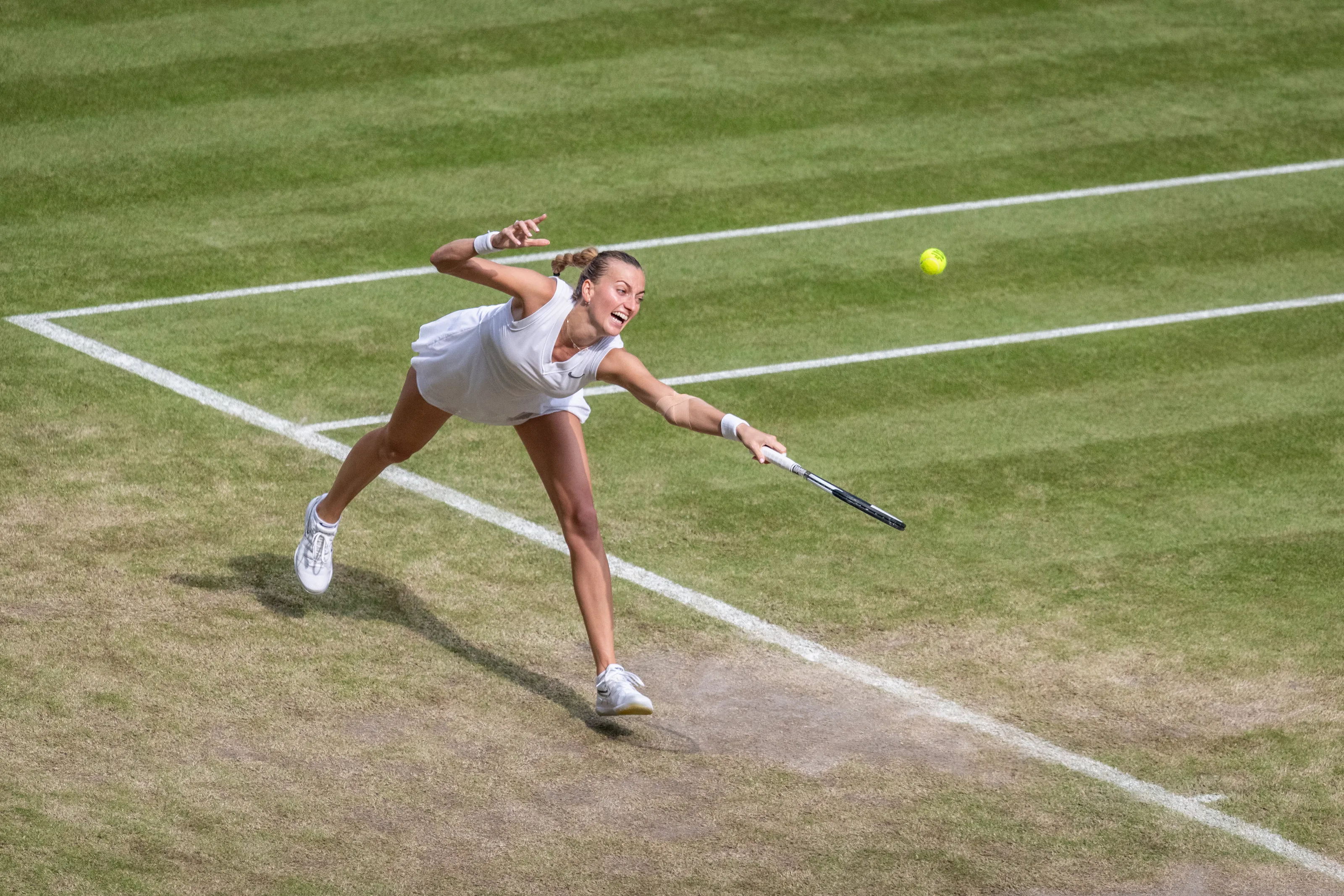Petra Kvitova at Wimbledon playing and losing to Jo Konta
