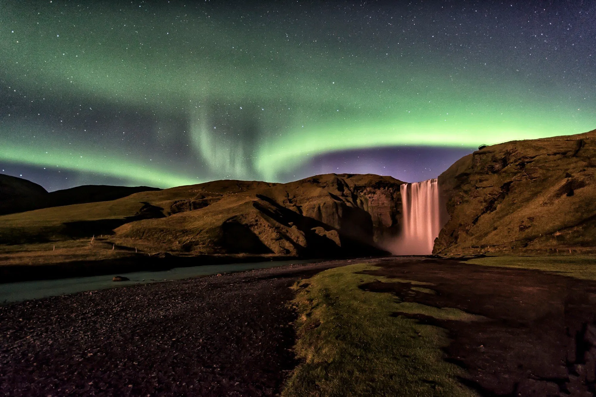 Northern lights on Skógáfoss, Iceland