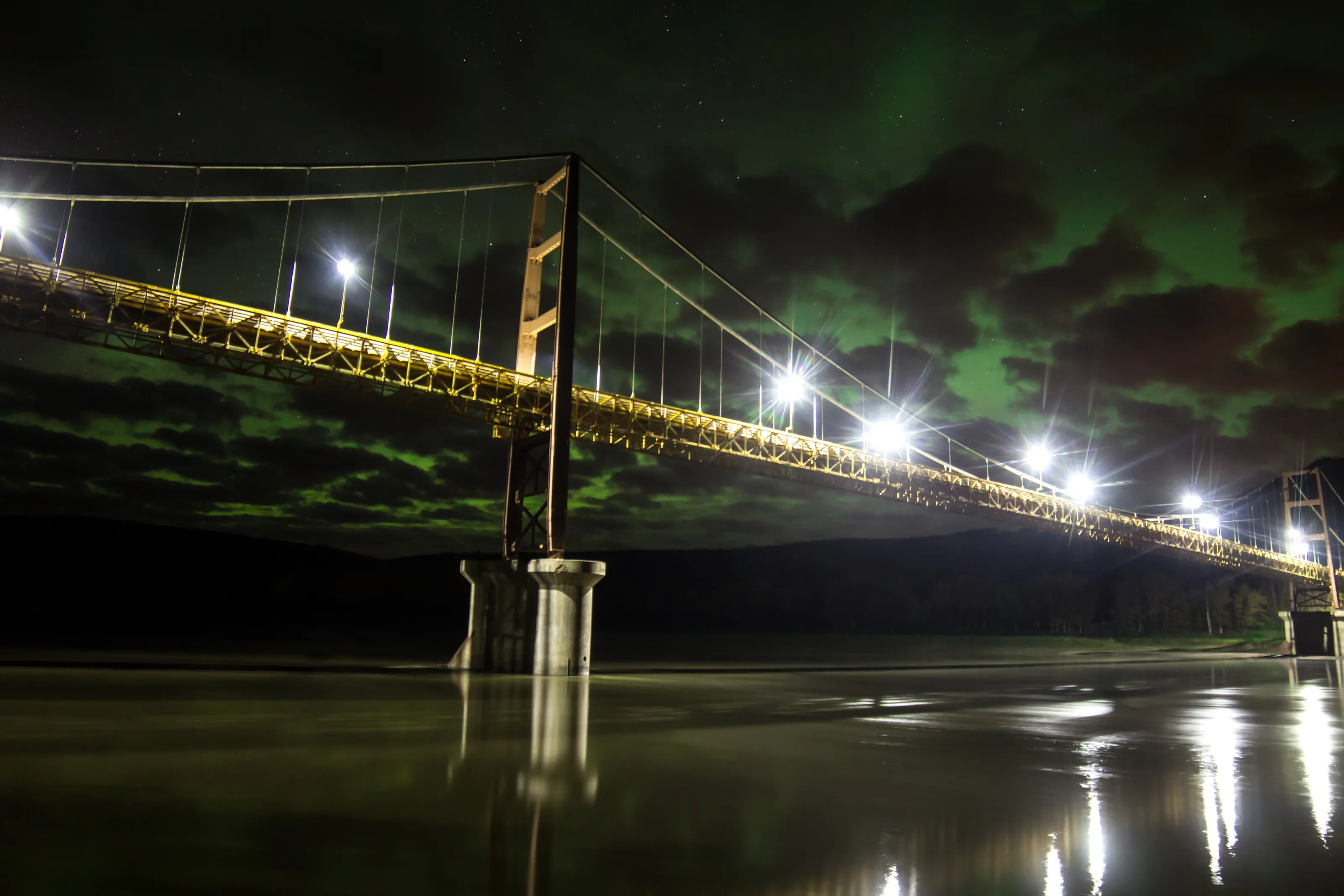 Bridge over a river, long exposure at night