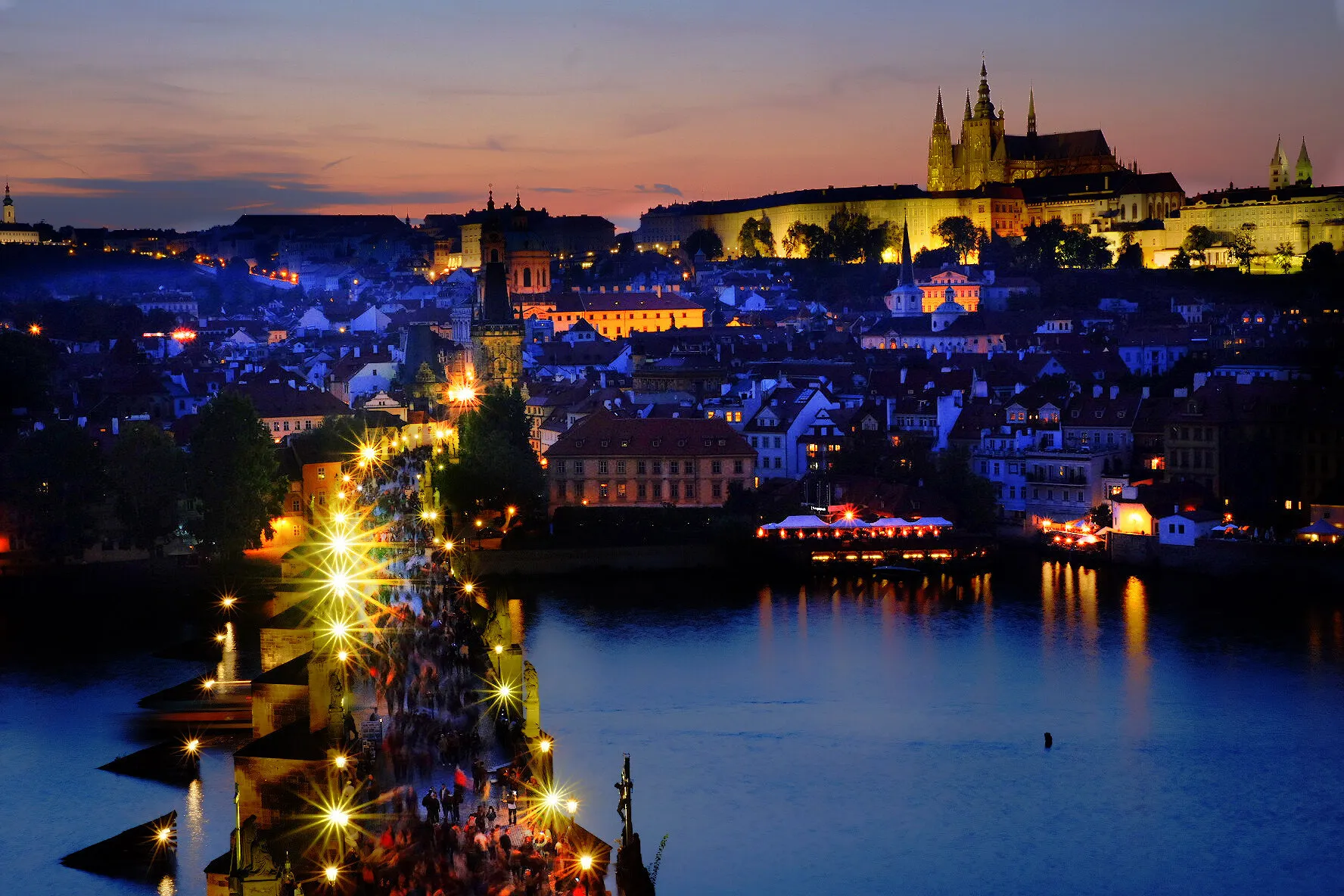 Charles Bridge and Prague Castle at dusk