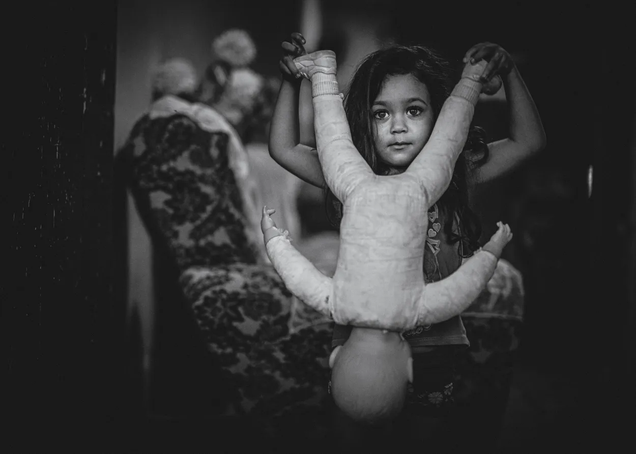 An angel and her doll
