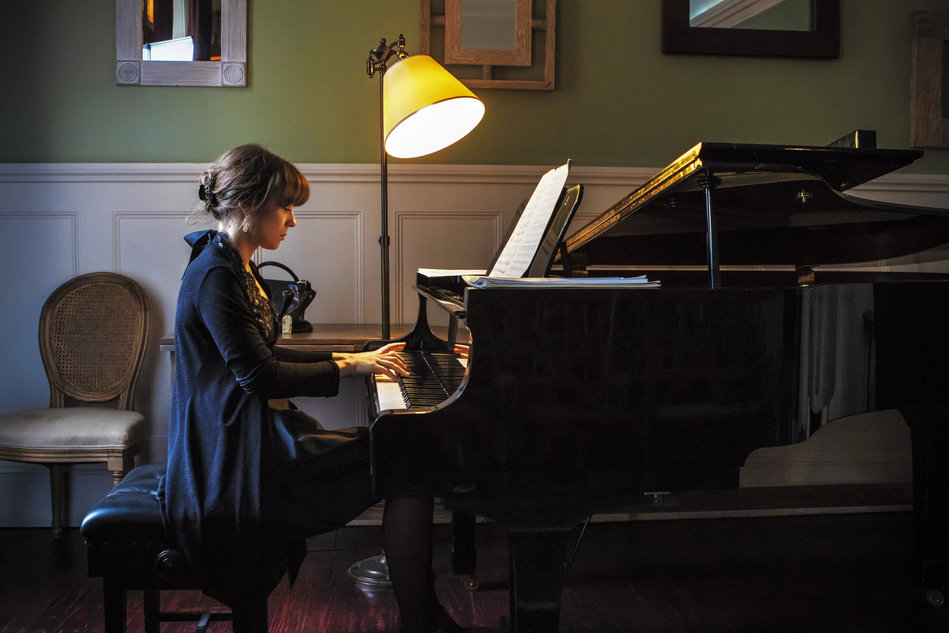 At the piano