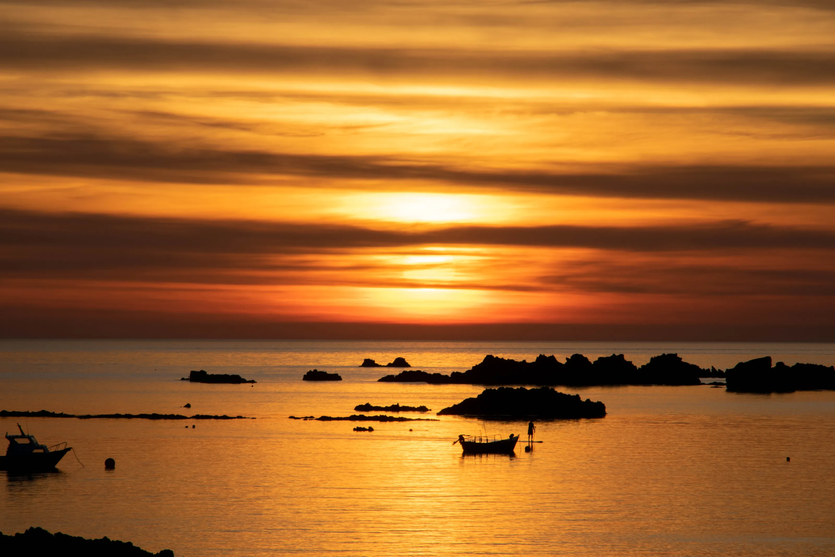 Sunset at Cobo Bay
