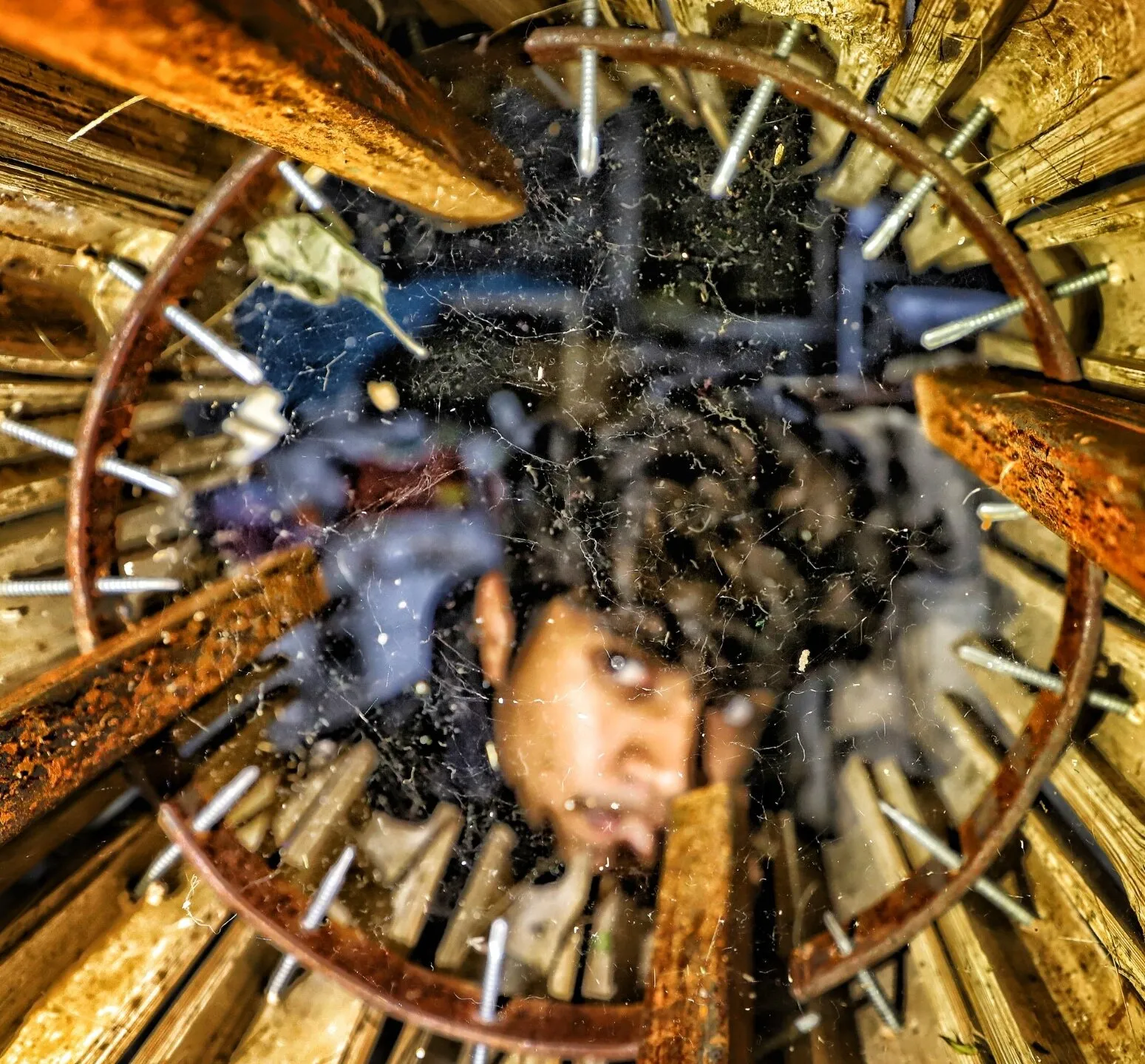 Boy behind the spider's web