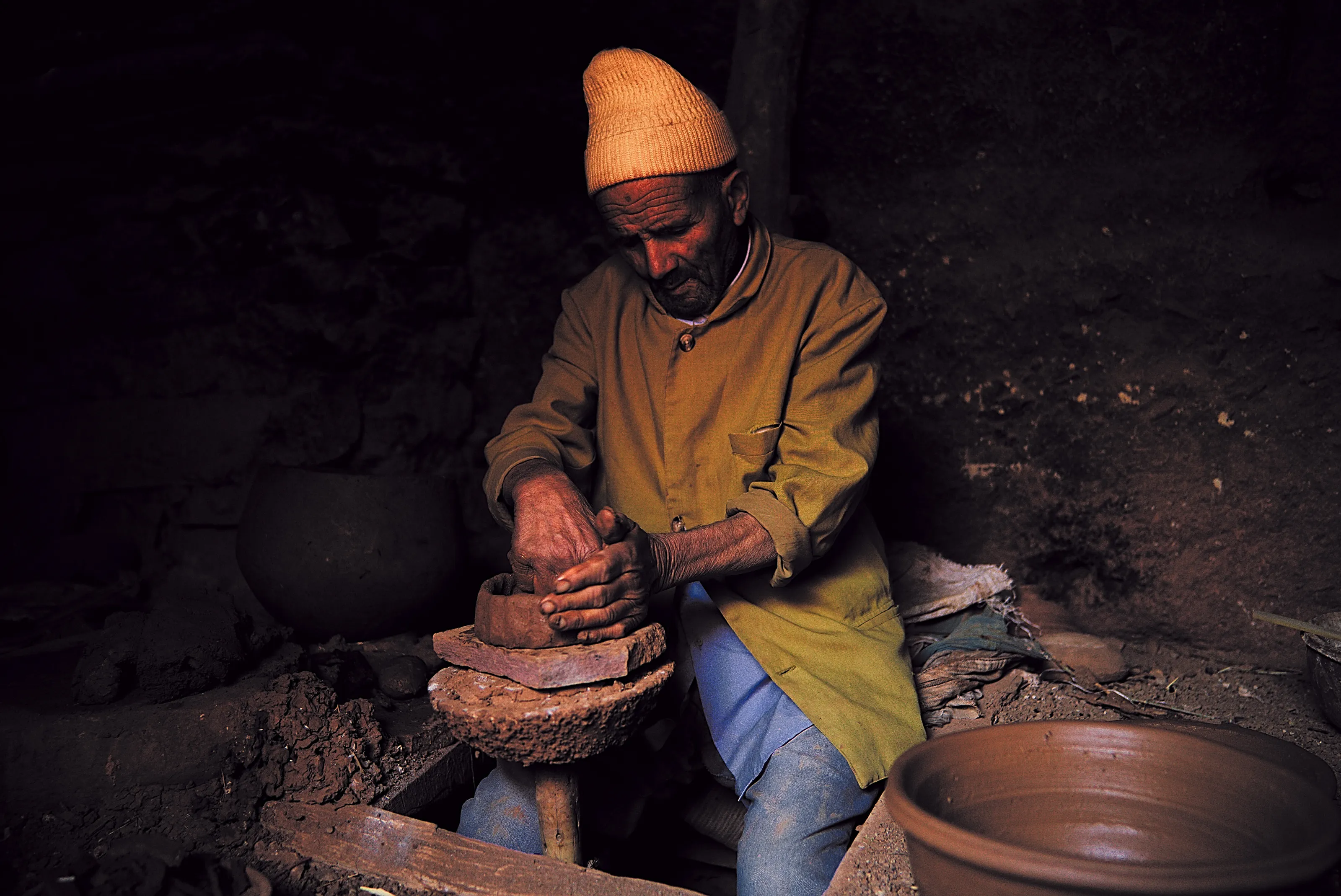 Berber doing pottery