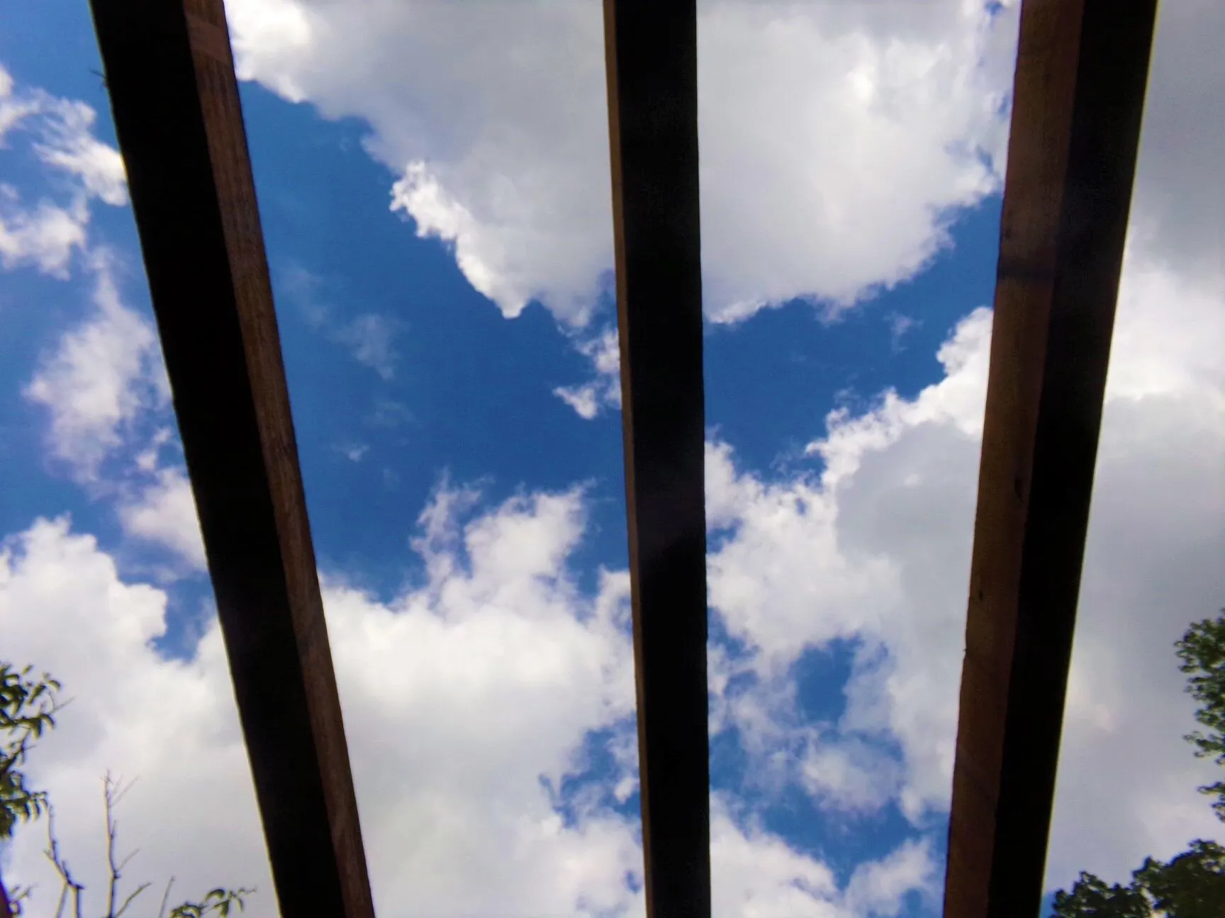 Blue Sky Beyond Fence
