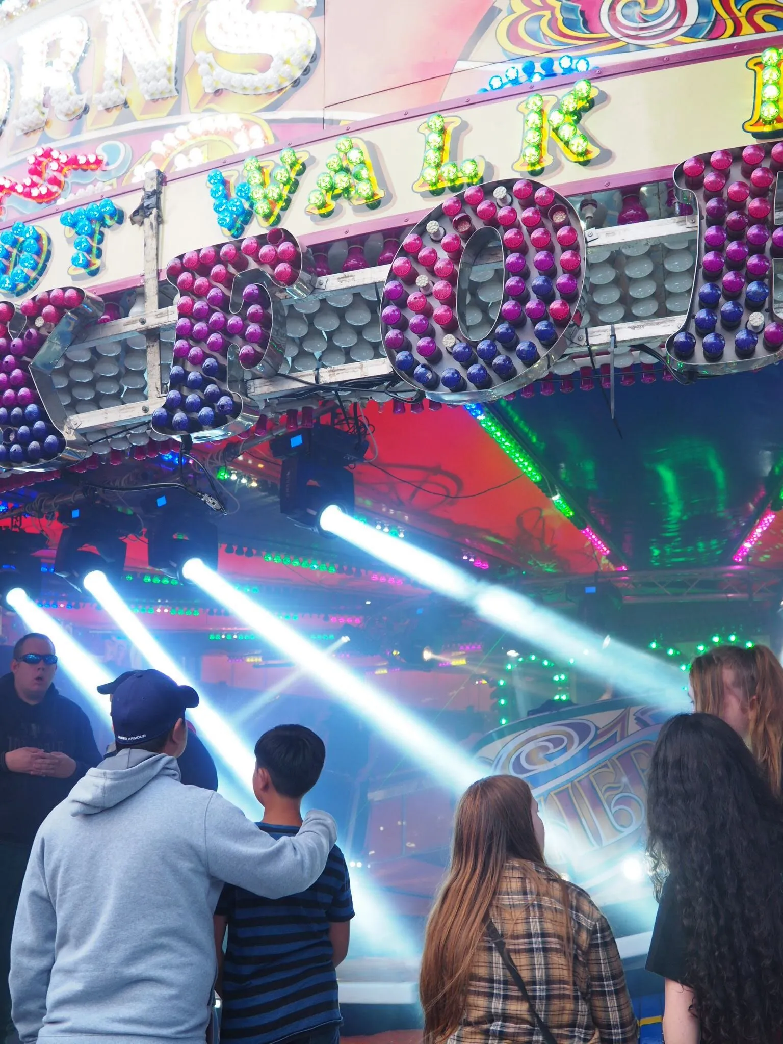 People queuing for waltzers