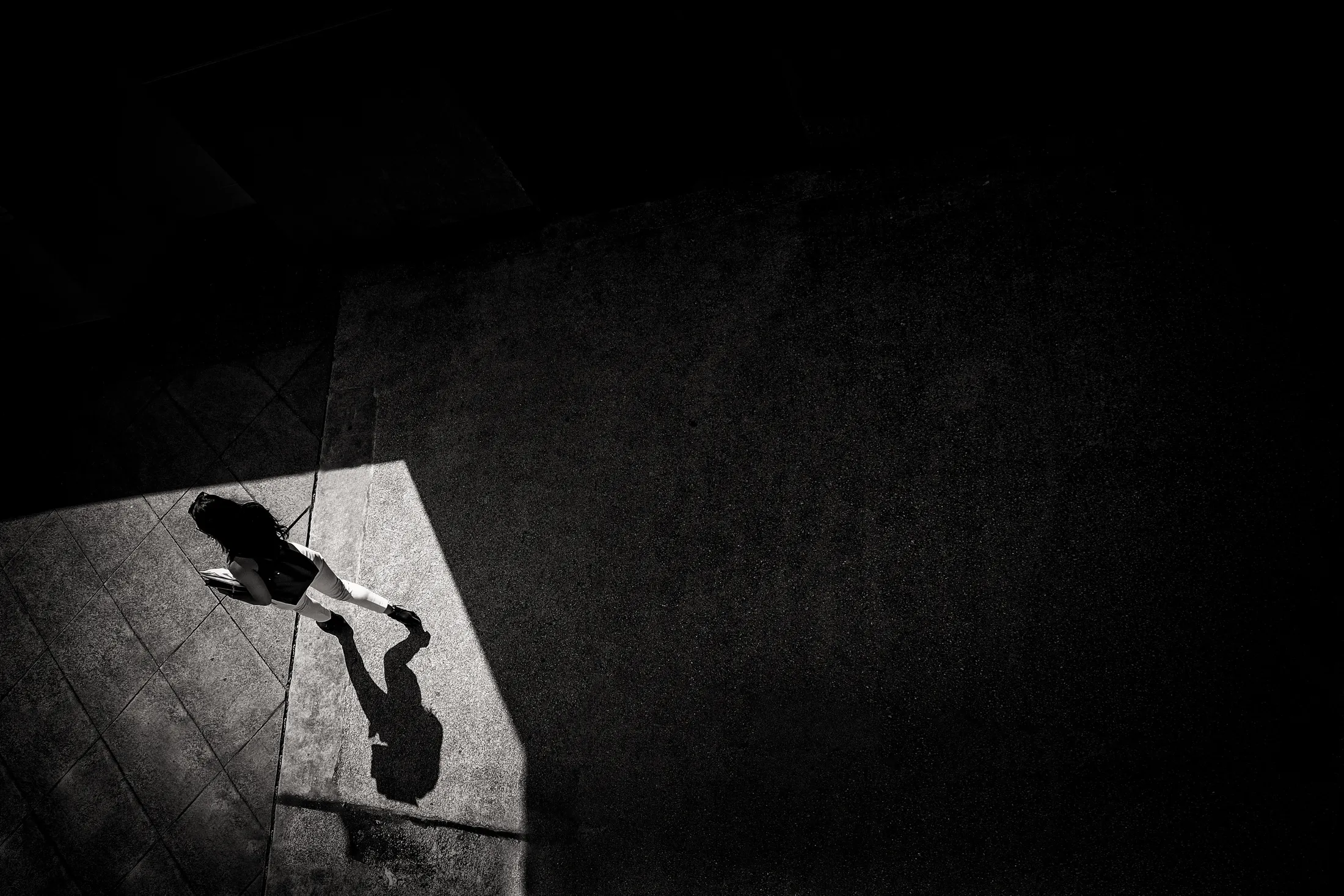 Woman in the corner from above