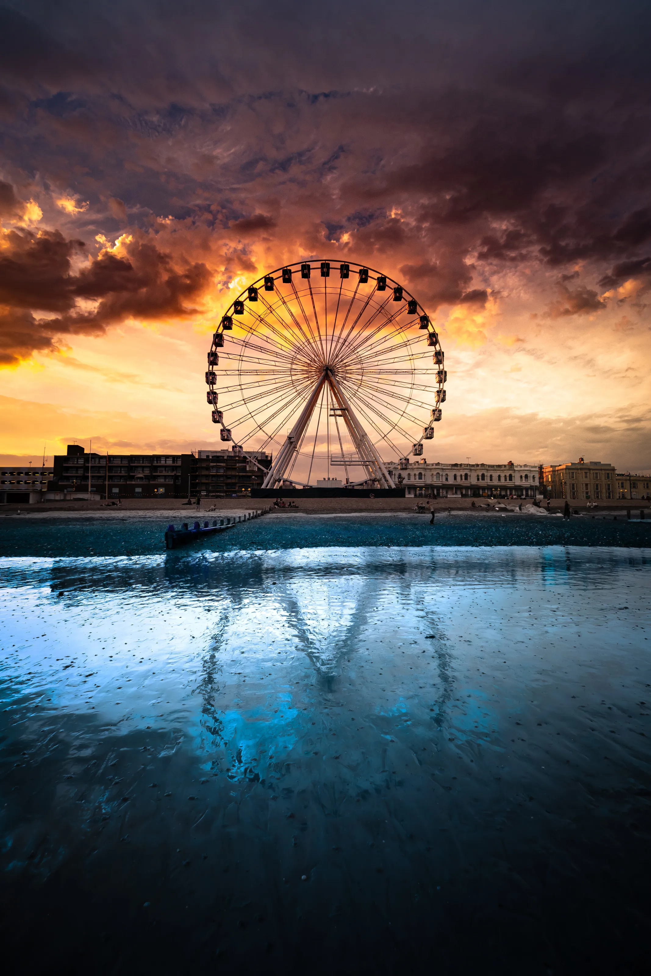 Ferris Wheel Reflection at Sunset