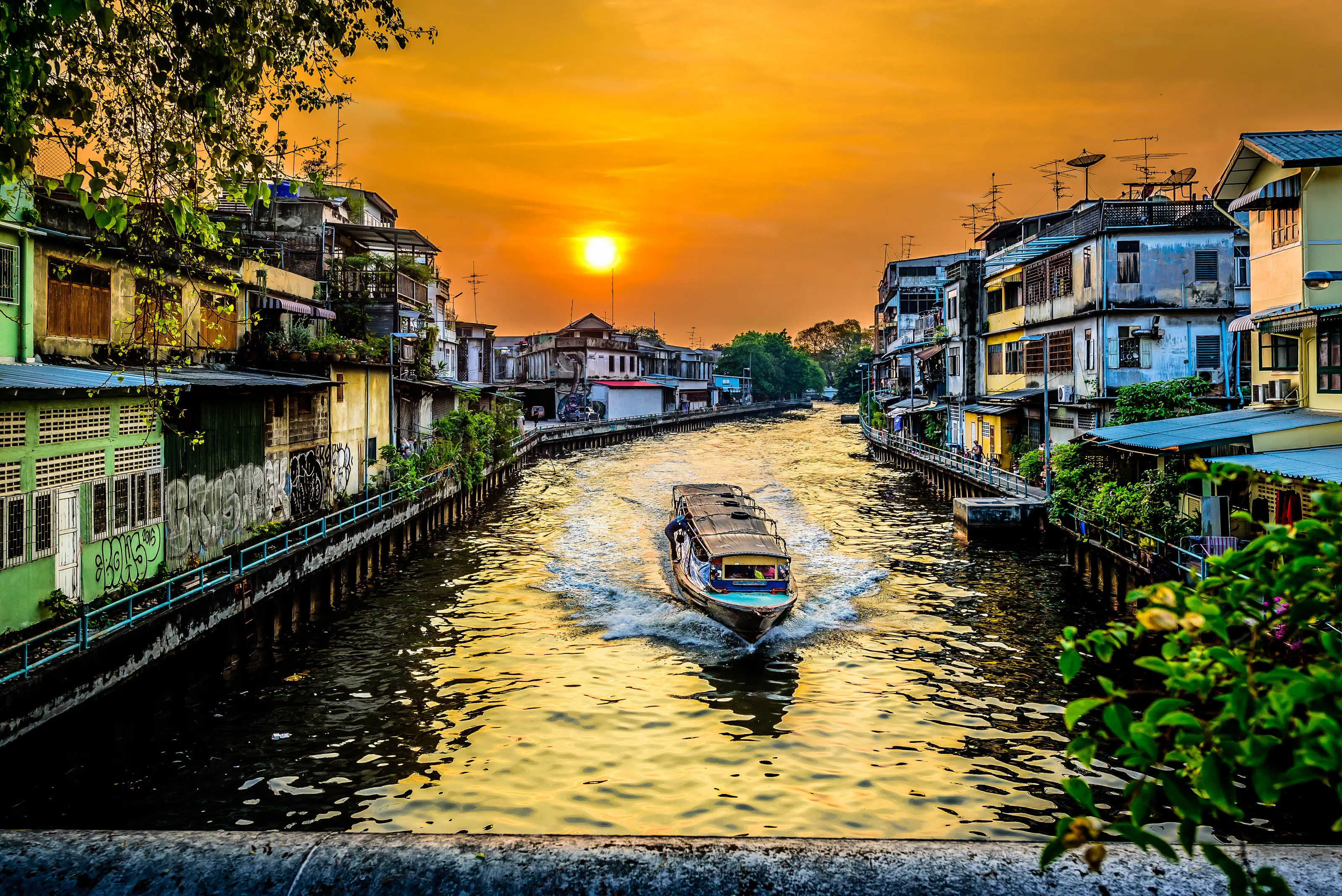 Bangkok canalboat by sunset