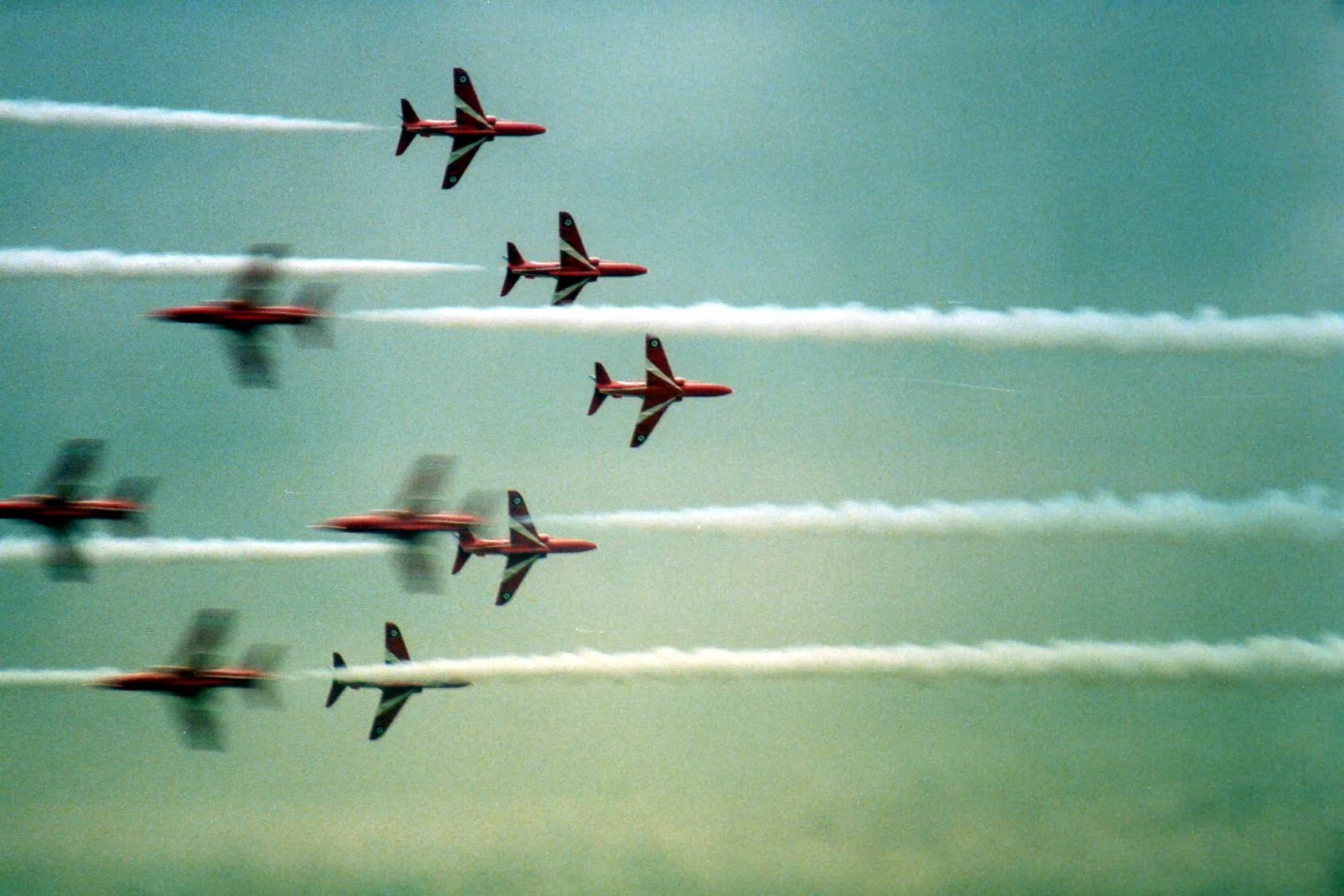 Red Arrows cross the sky