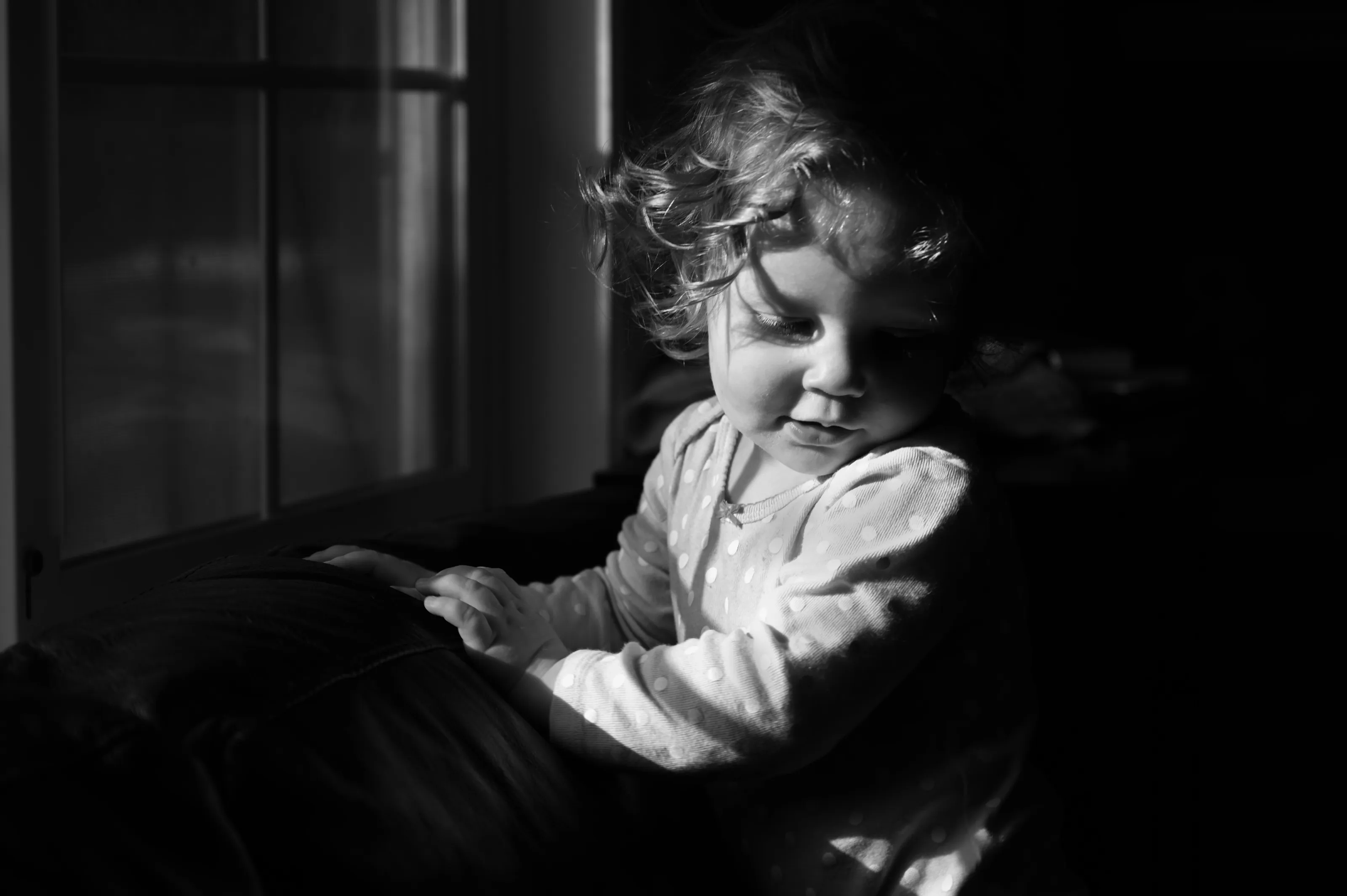 Baby girl in sunlight