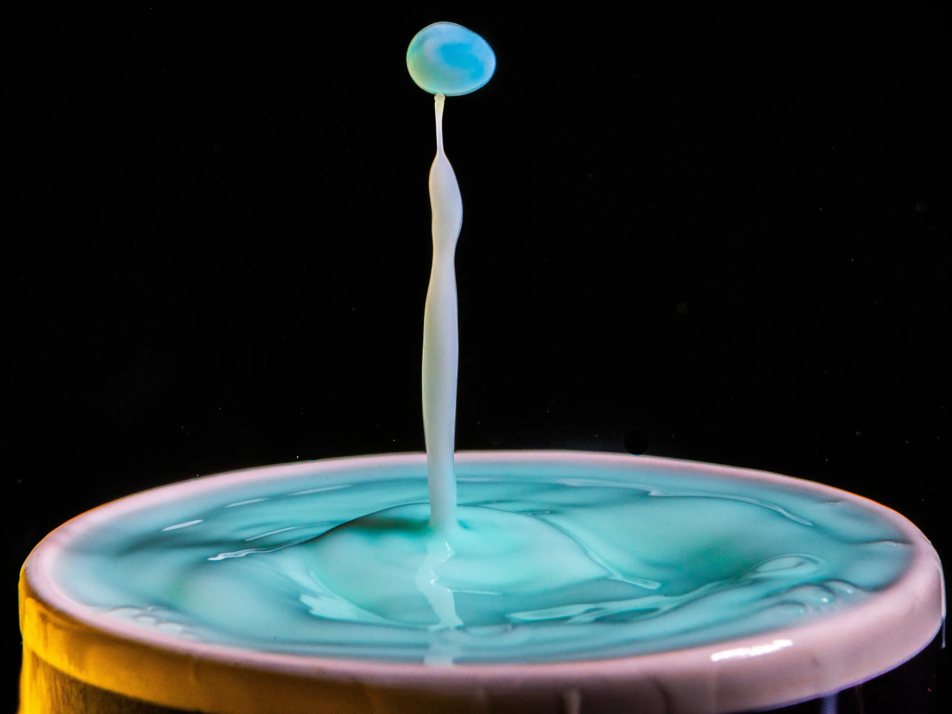 Just a drop, rebounding from its fall