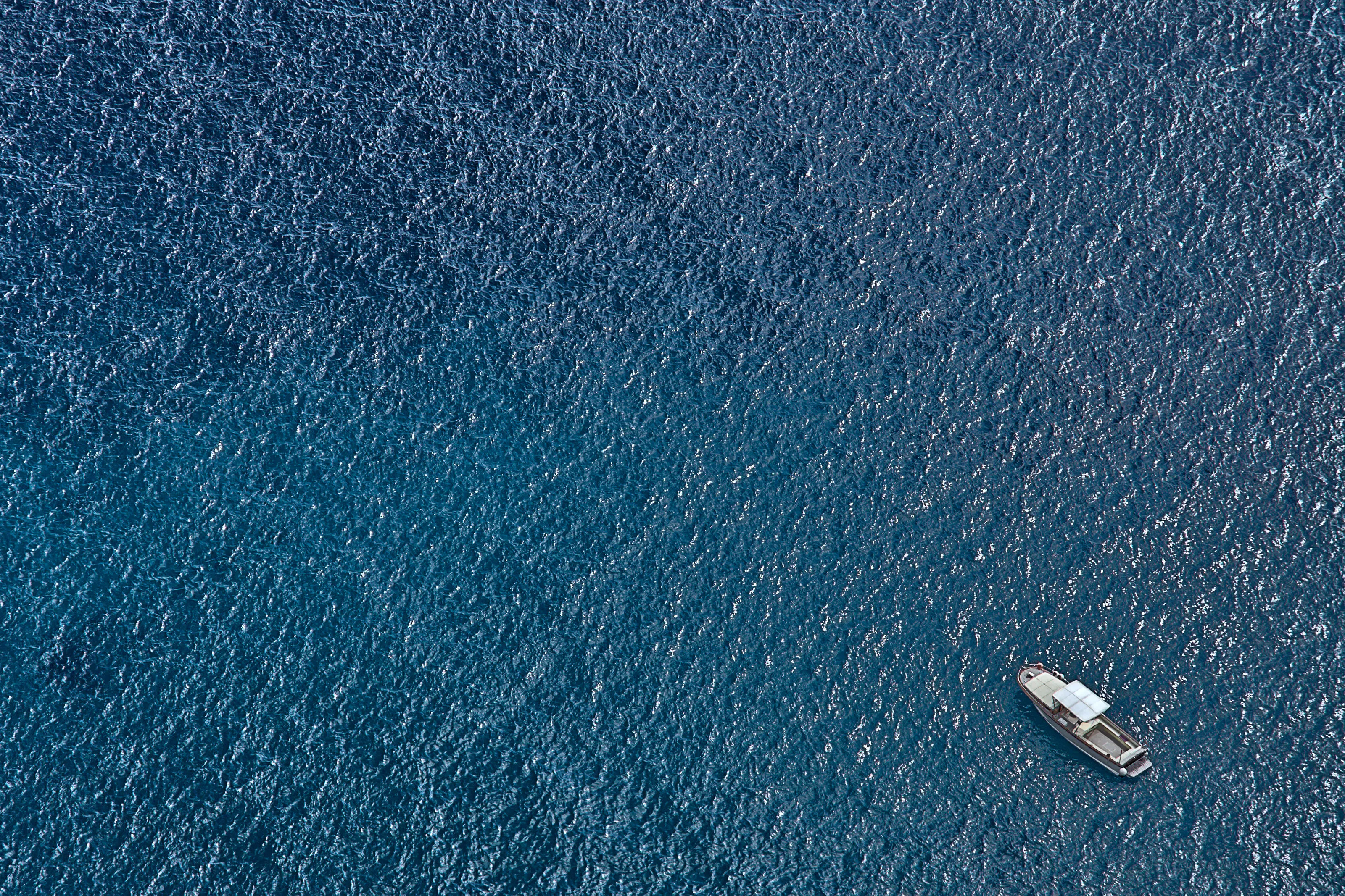 Small Boat on Blue Sea