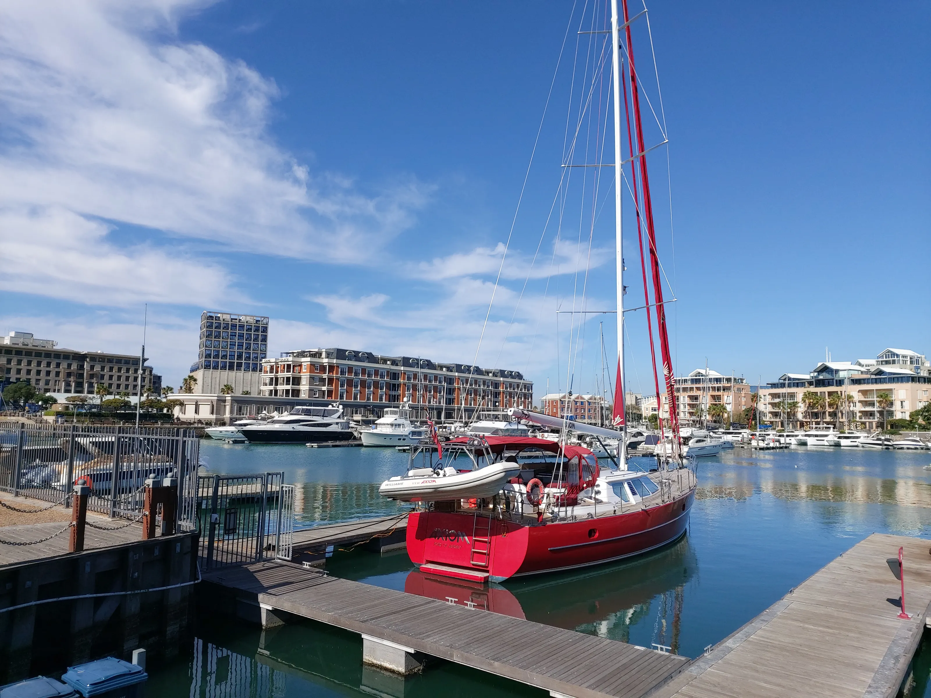 Small red boat in the V&A Waterfront harbour