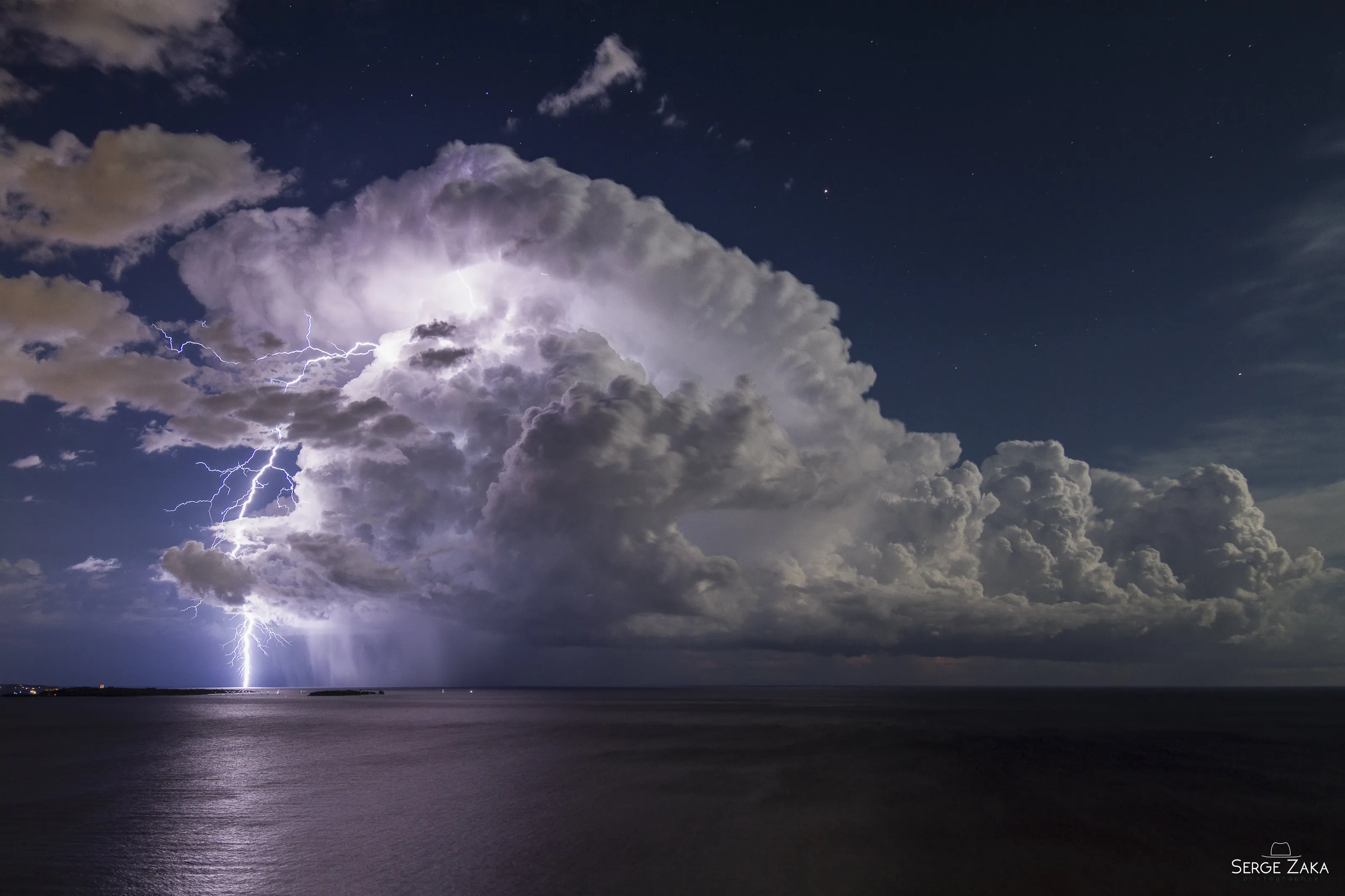Lightning from an isolated storm over Cannes' bay