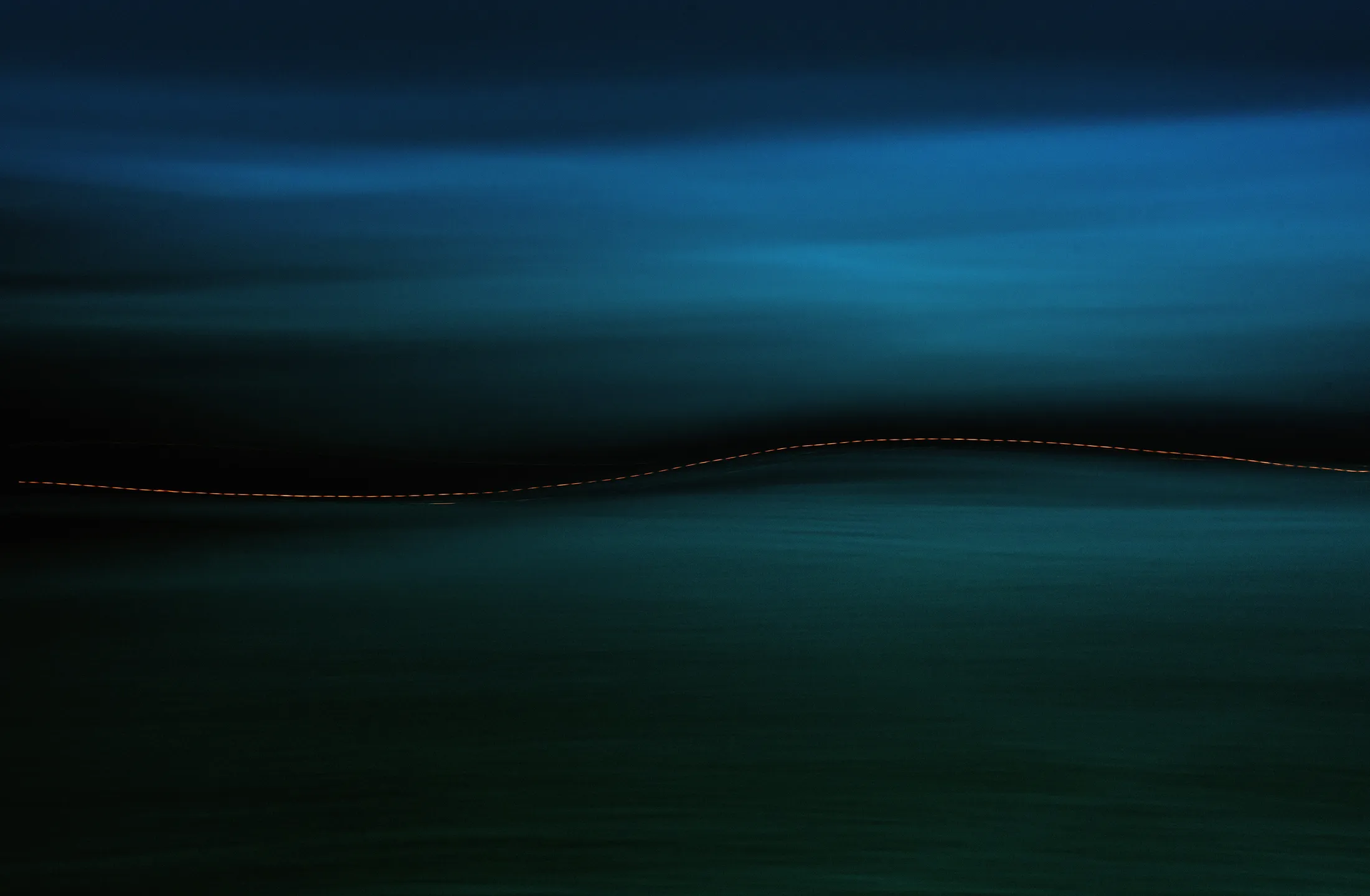 The opposite shore - gentle fjord night-time motion