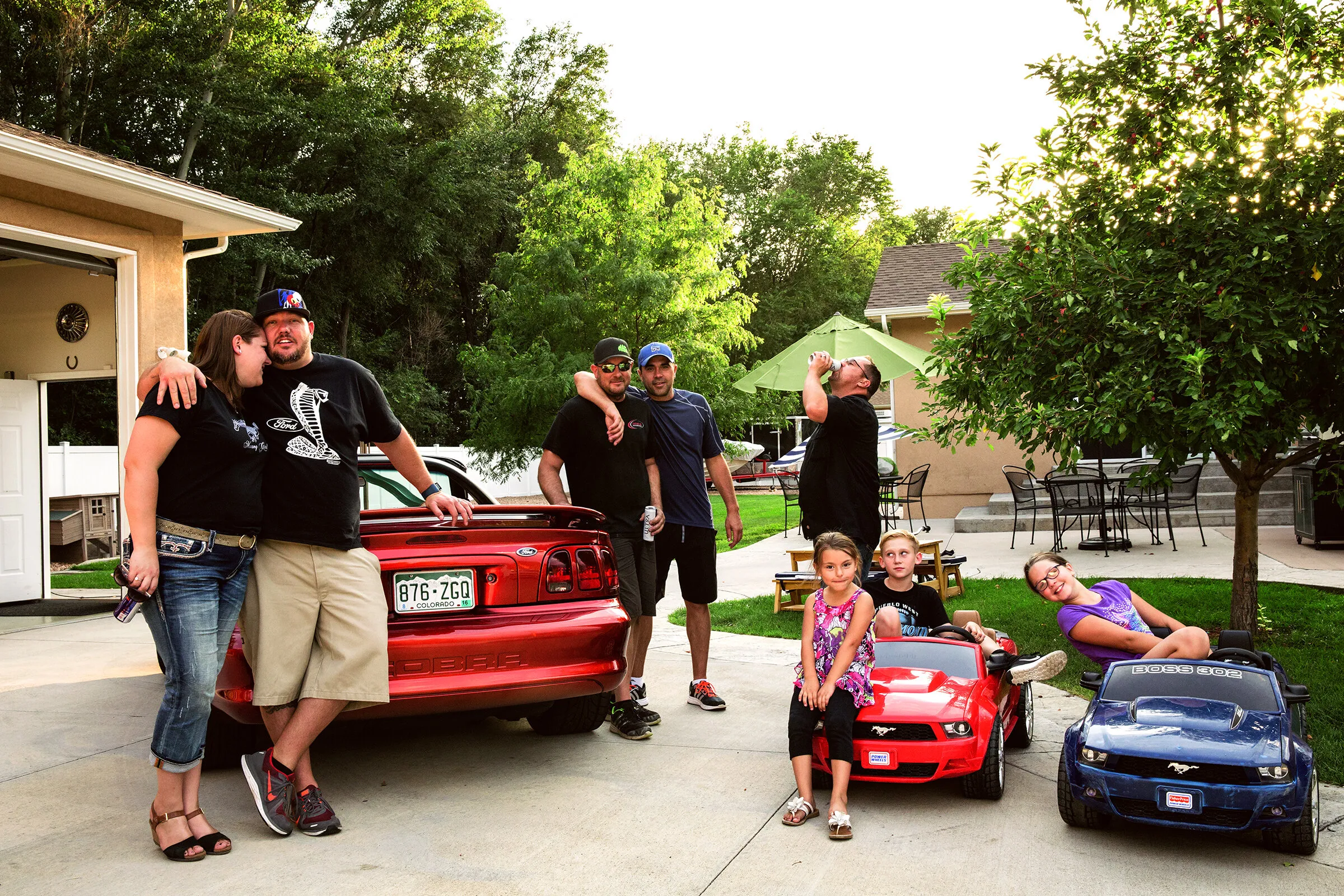 Brandon and Friends with his 1996 Mustang SVT Cobra and a couple of toy Mustangs
