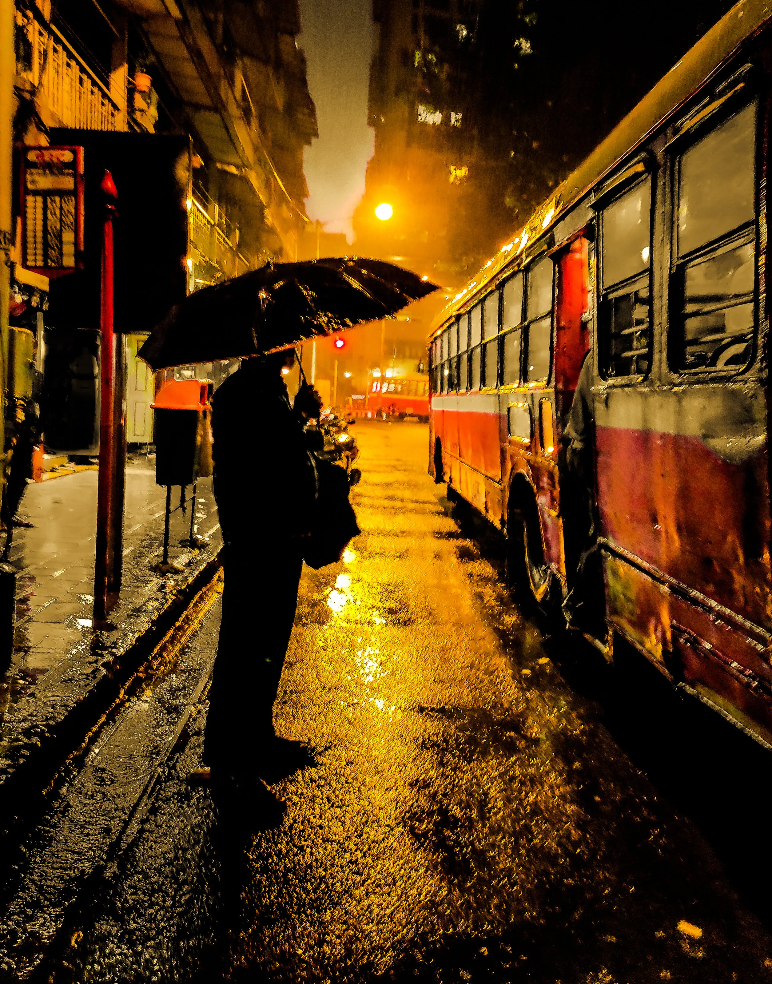 Golden rainy street of mumbai