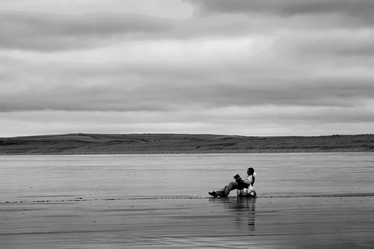 Big beach, one man.