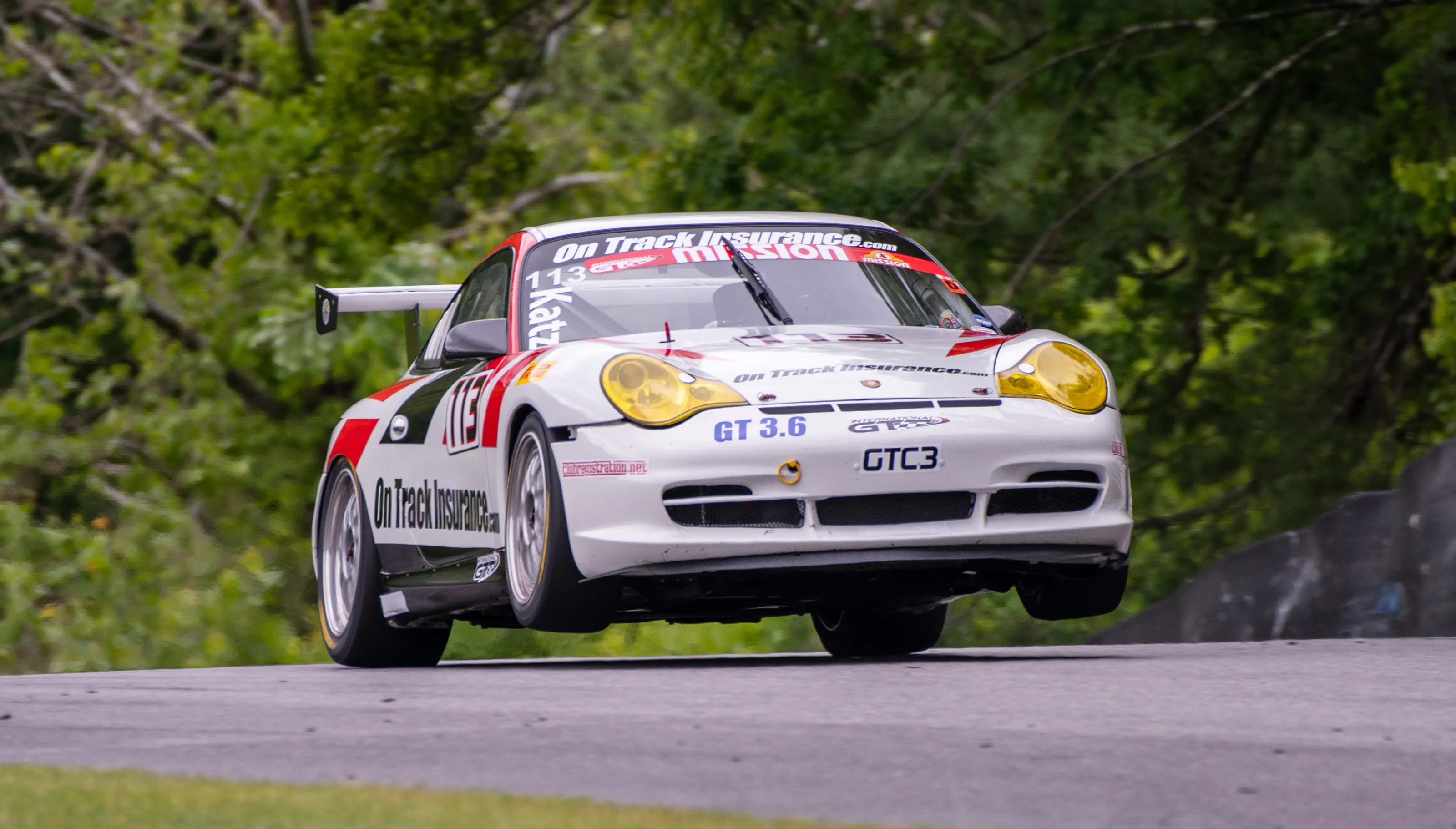 Catching some air on the uphill at Lime Rock Park Race Track
