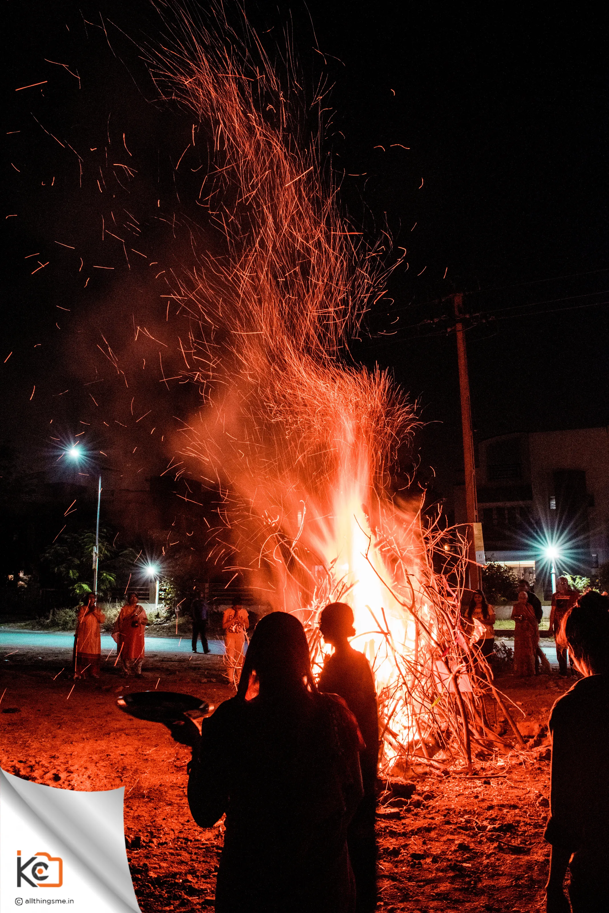 People worshiping the fire god on a wonderful moonlight night