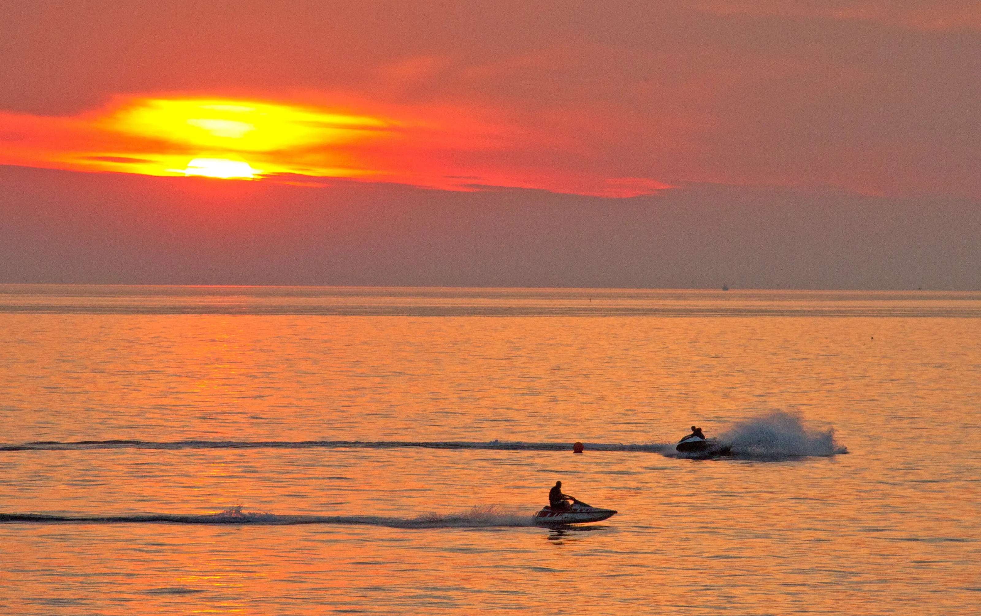 Jetski's at sunset