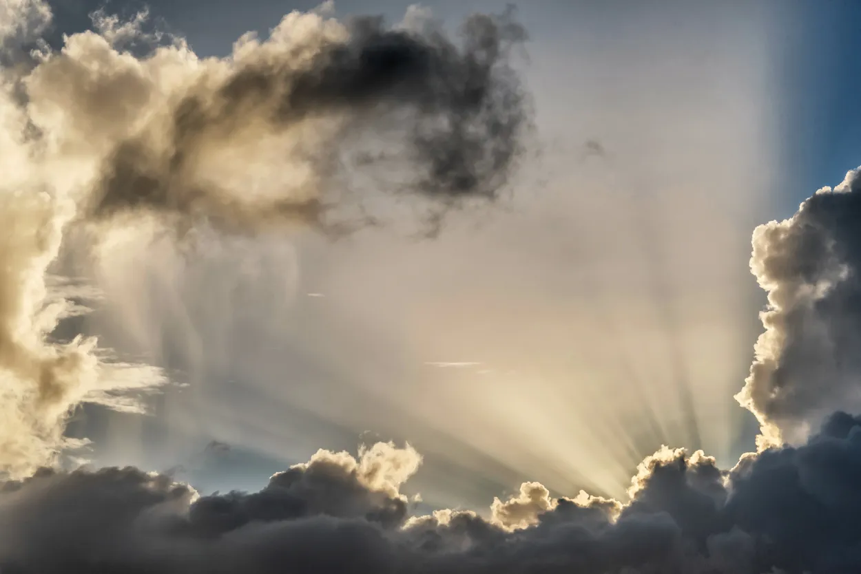 Sun behind the clouds