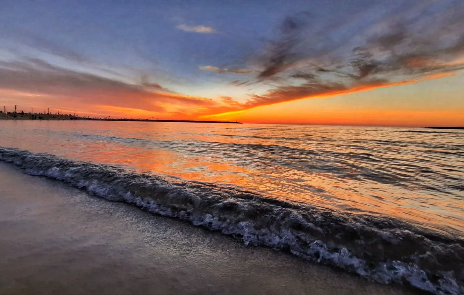 Sunset is reflected with the water