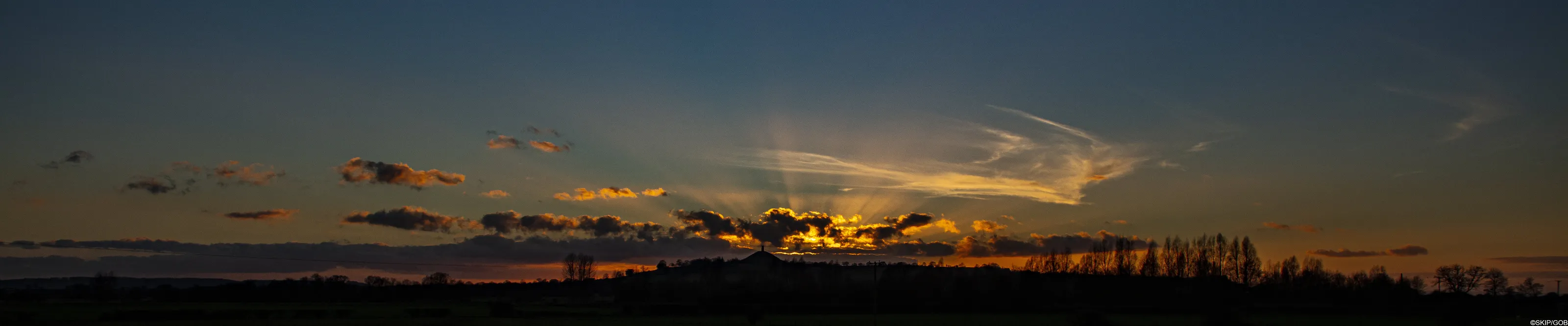 Sunbeams Over Glastonbury Tor
