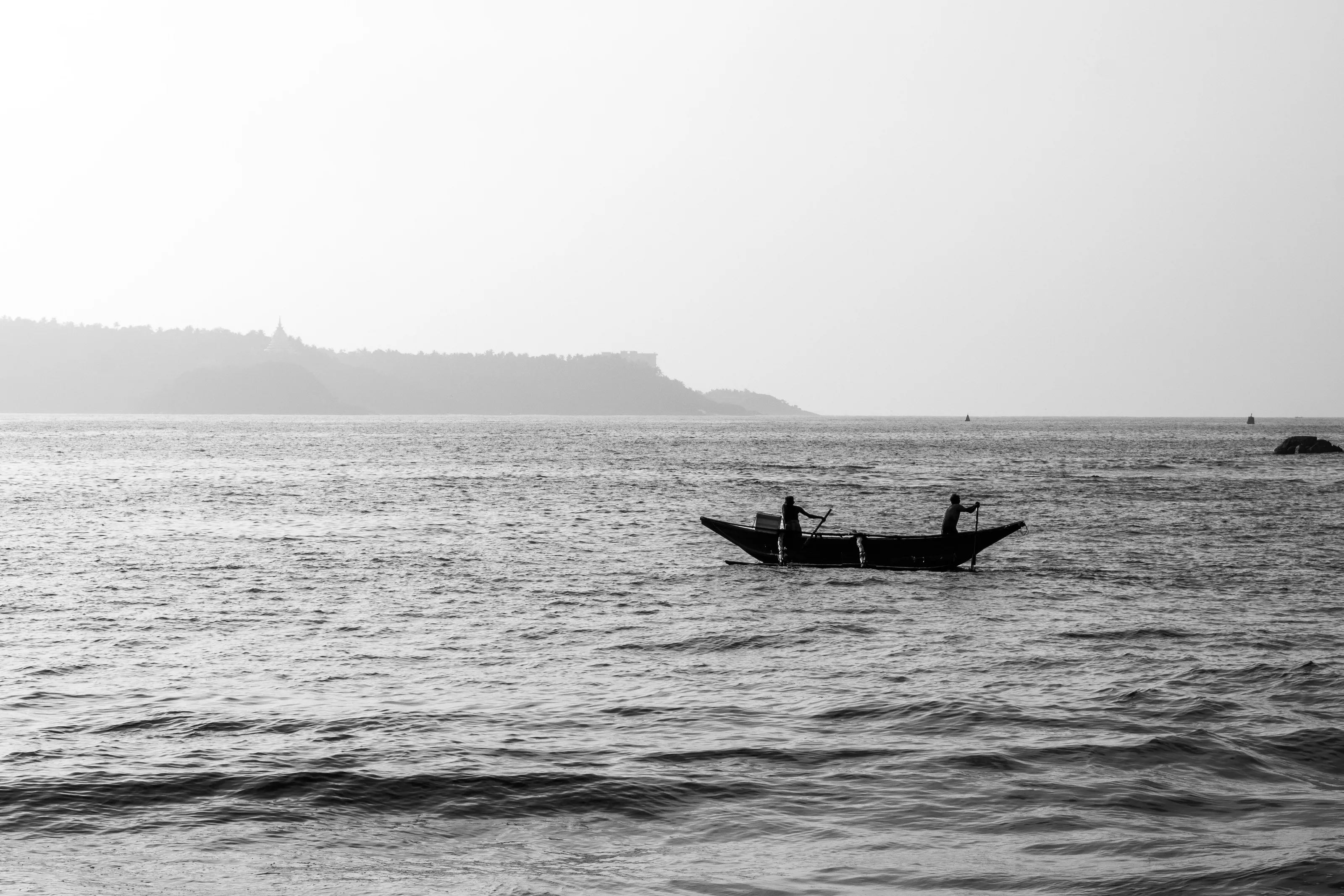 Fisherman towards the sea