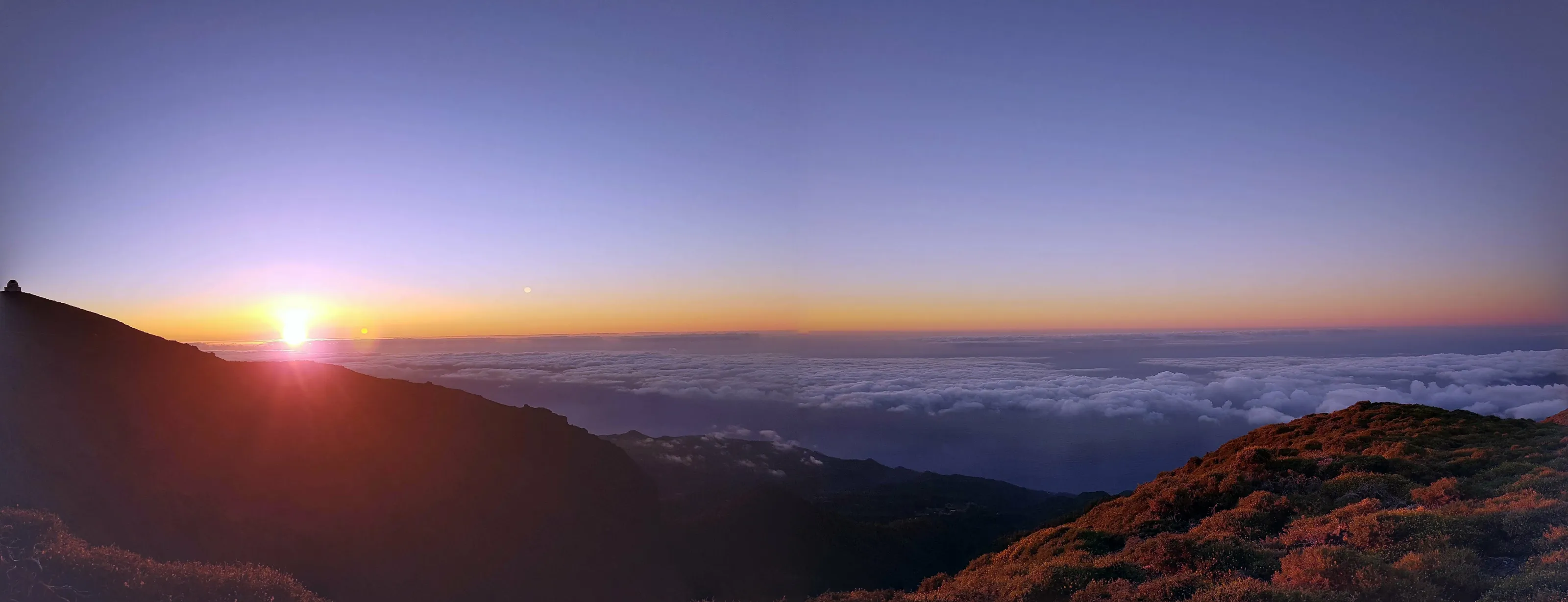 Sunset above the clouds