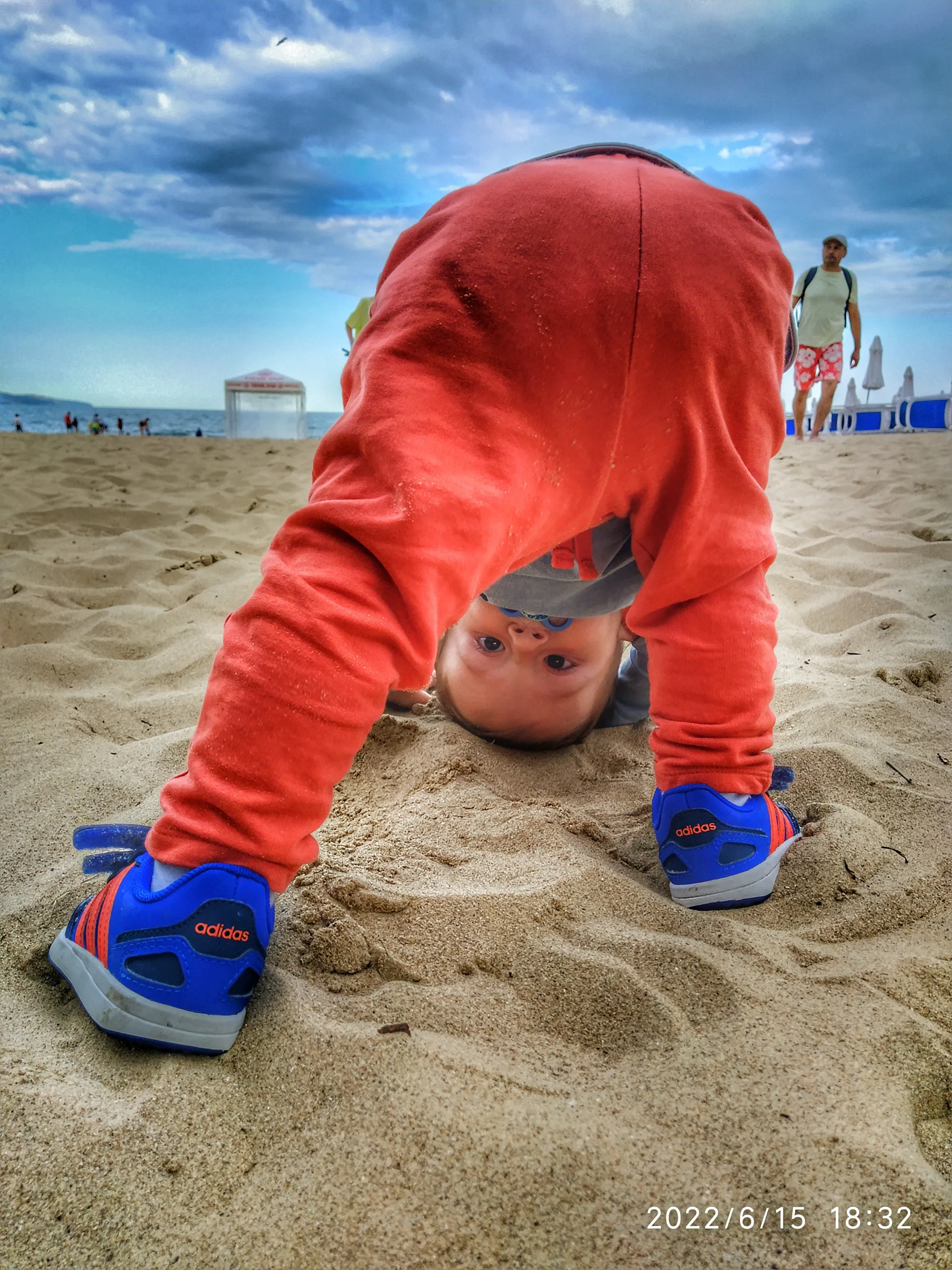 Little boy playing on the beach
