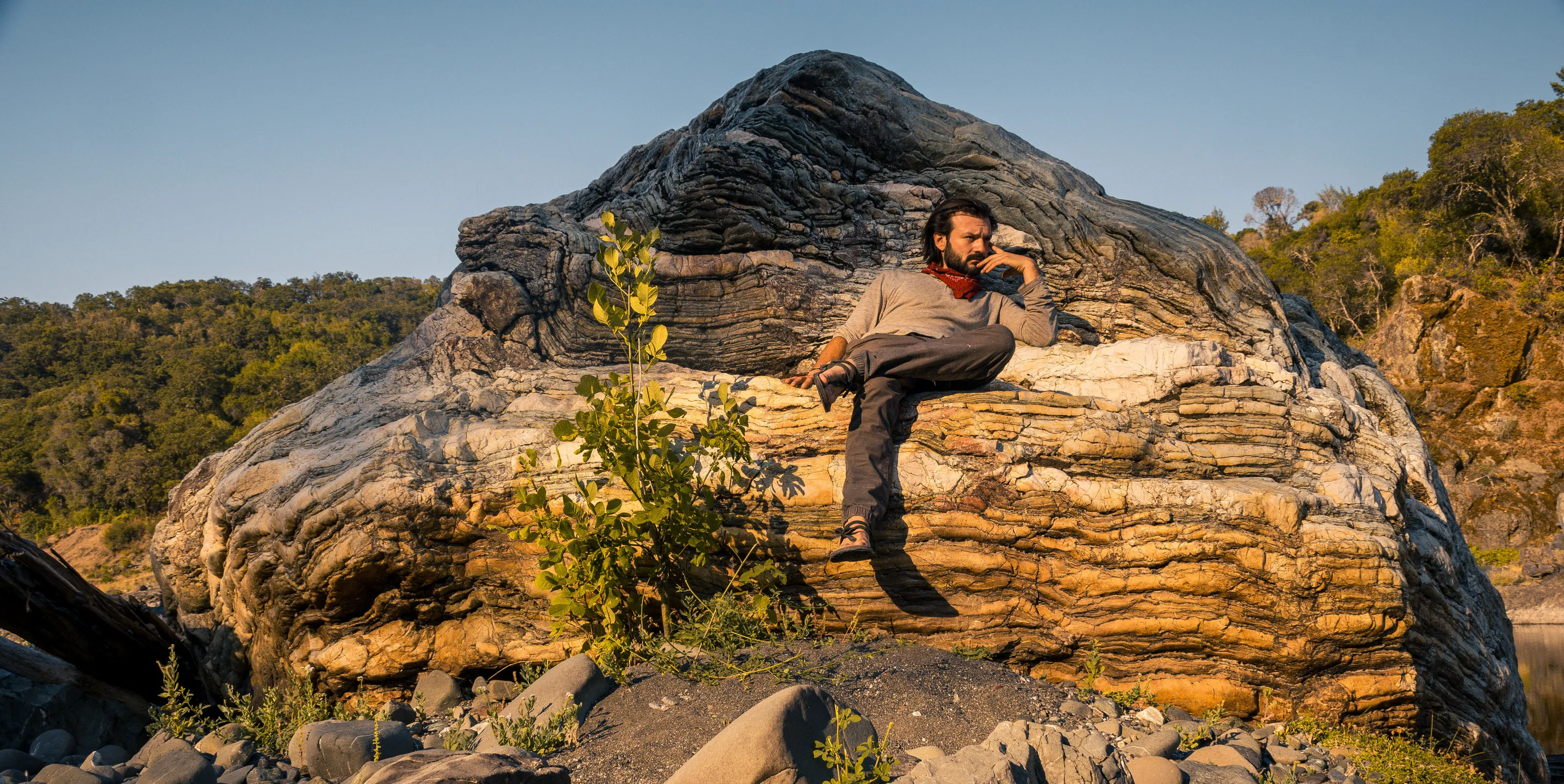 Reclining Self on River Boulder