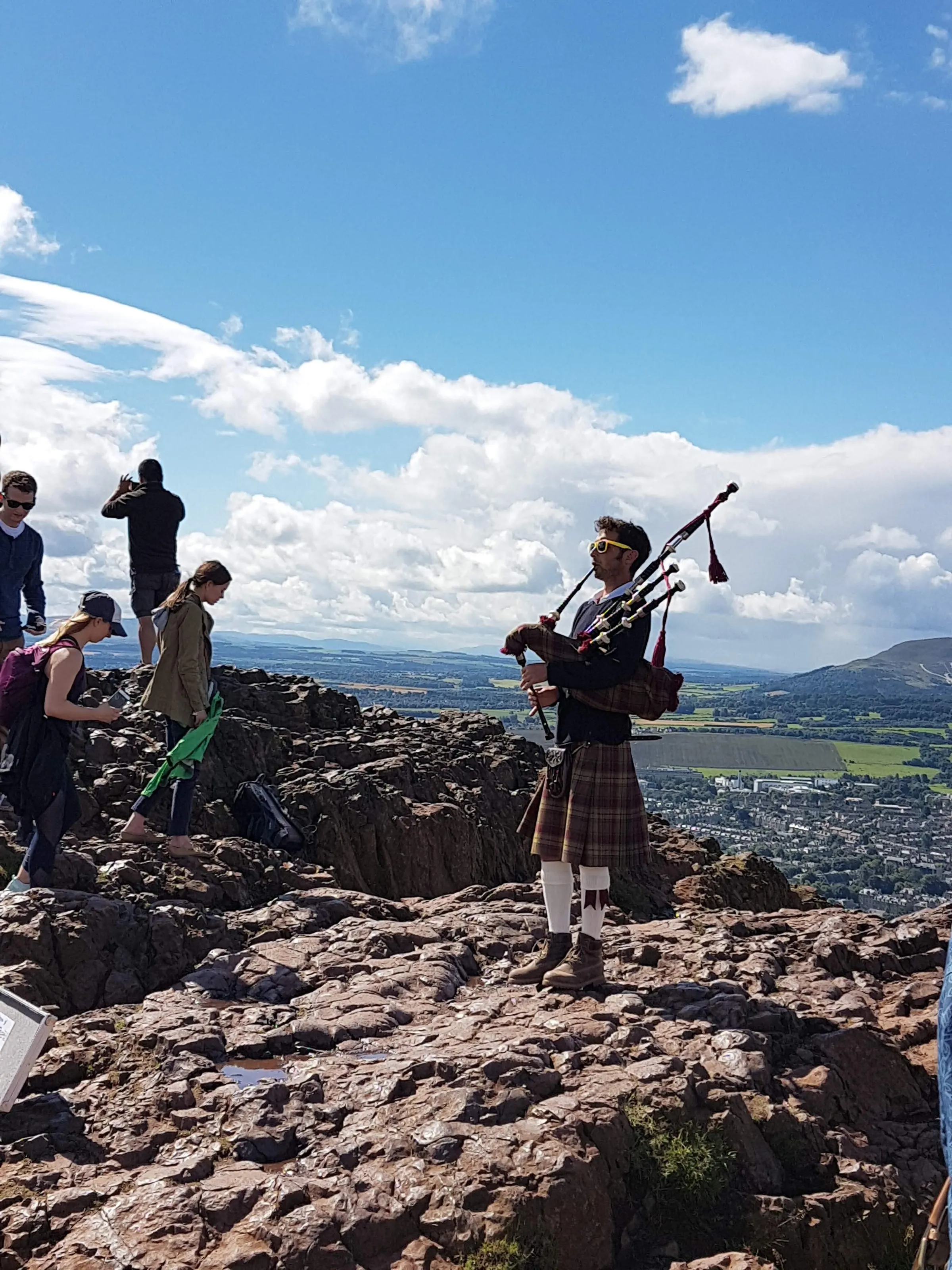 Highland Piper at the top of Arthur's Seat, Edinburgh