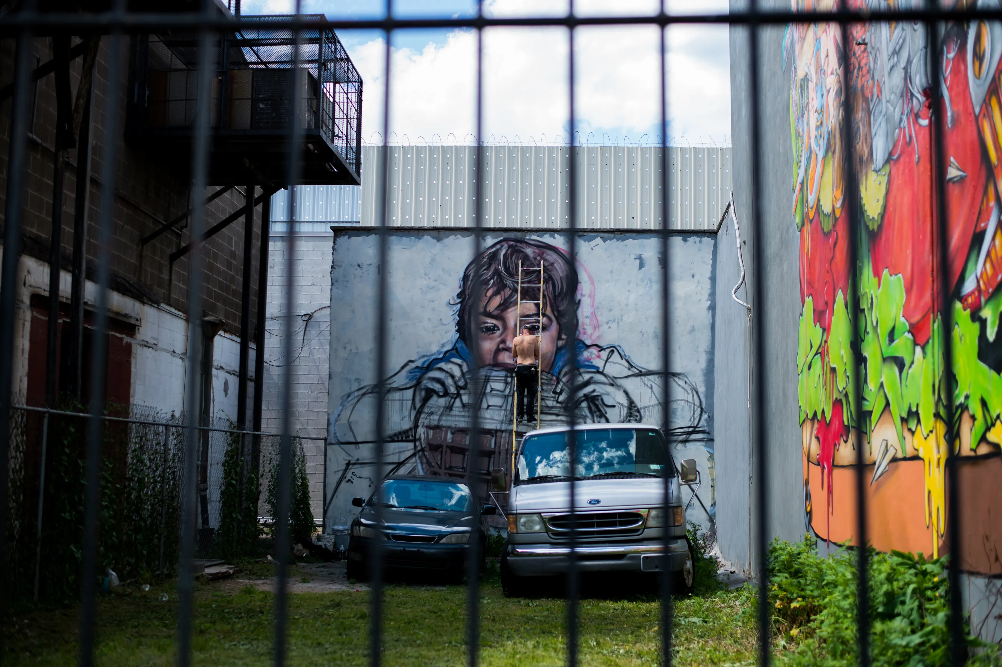 ladder up, finishing his art