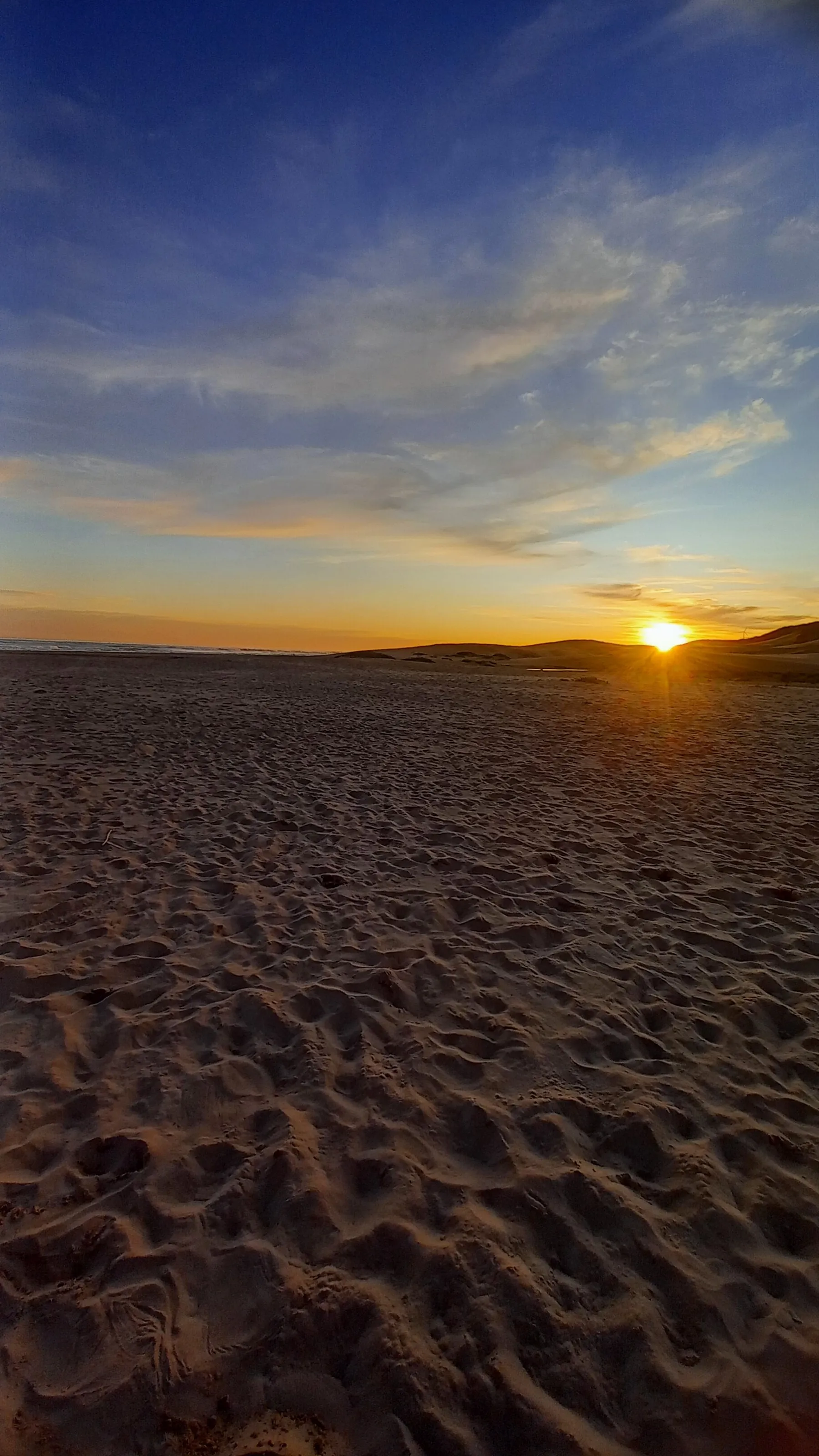 A perfect beach sunset, celebrating Womens Day in South Africa.