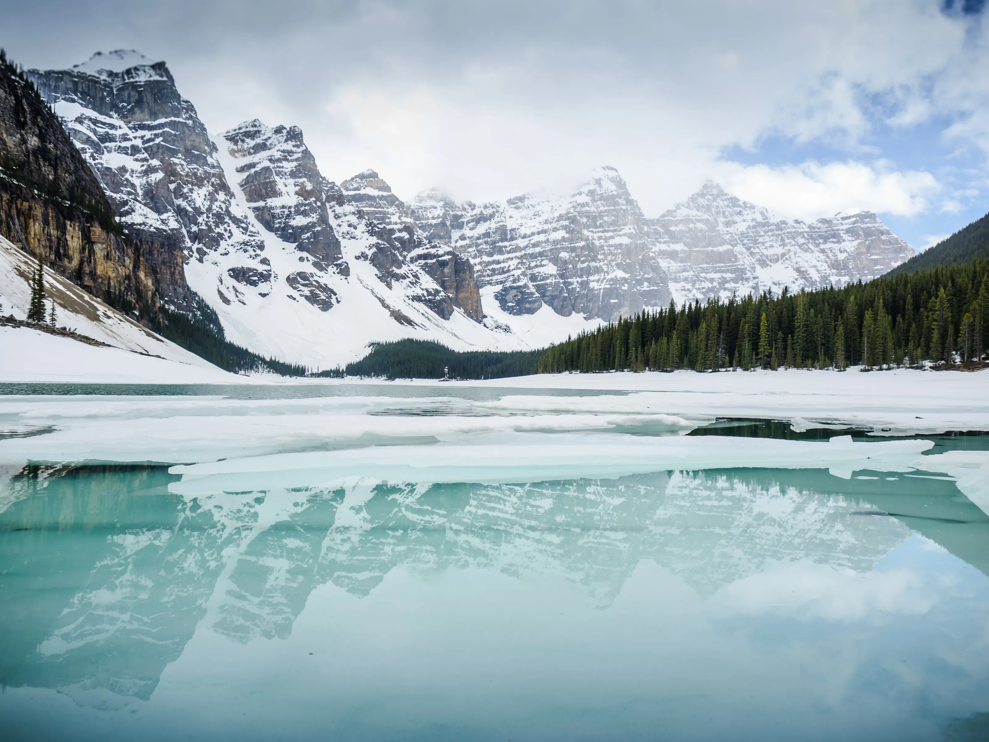 Melting Moraine Lake and 10 Peaks Reflexion